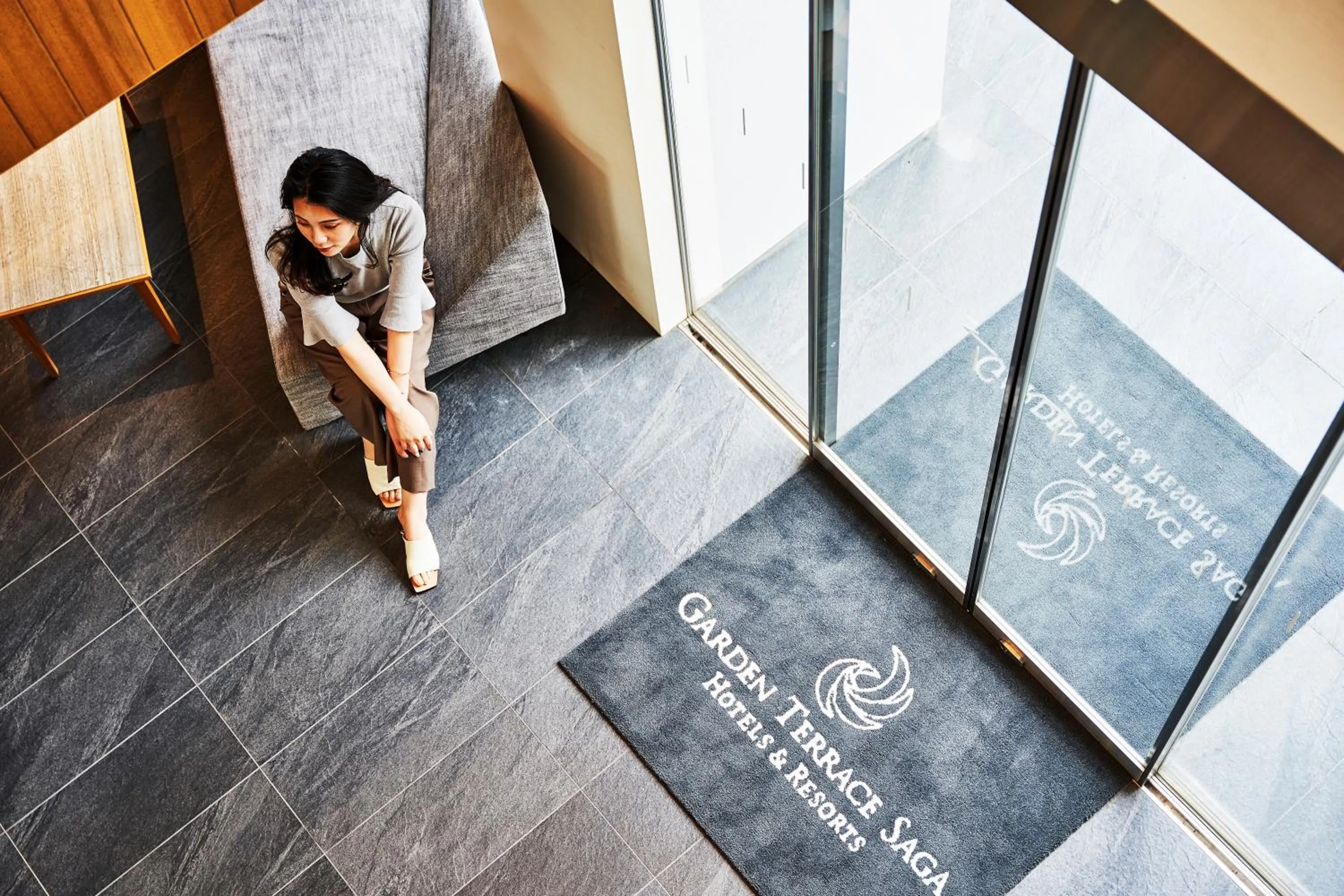 People in Garden Terrace Saga Hotel & Resorts