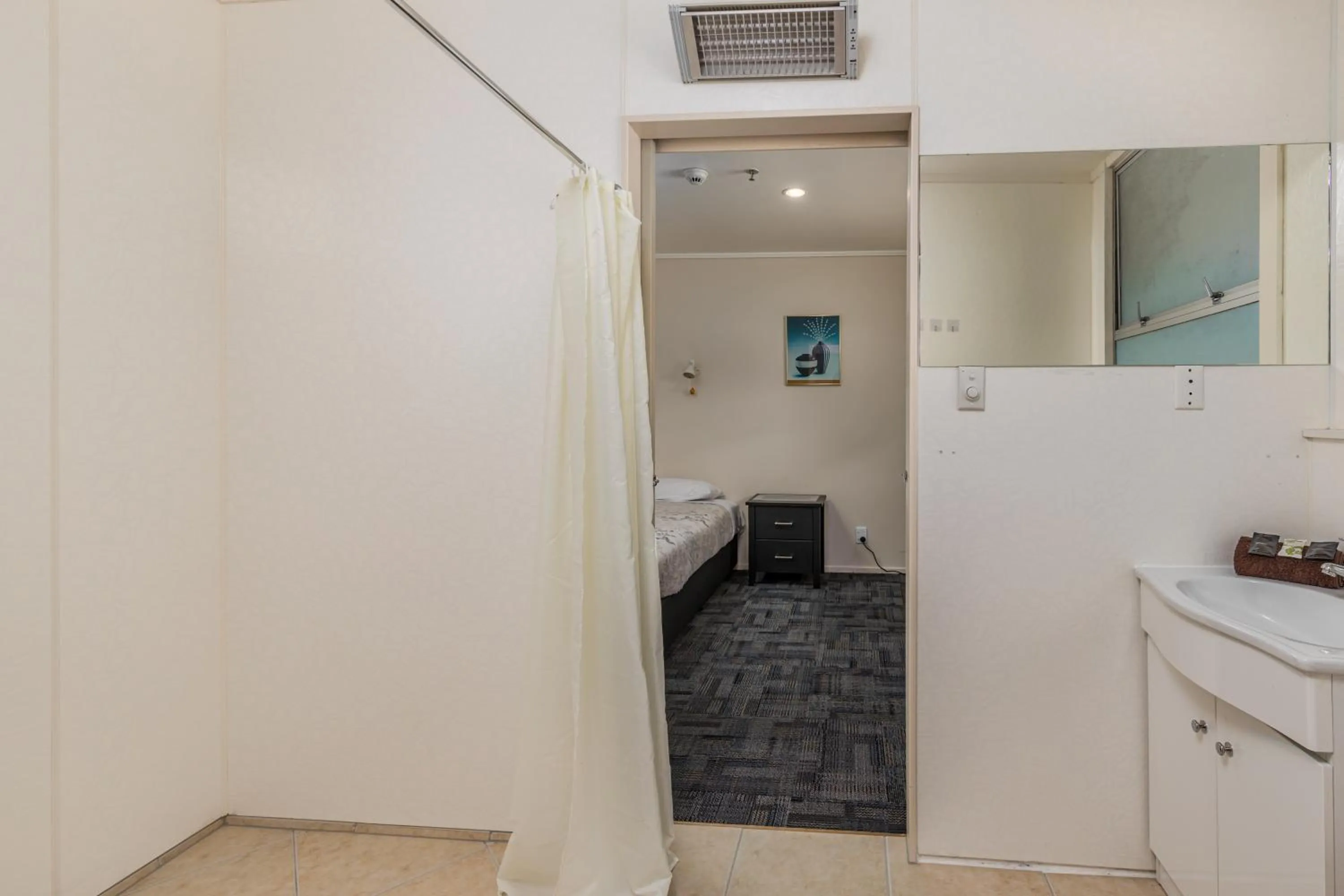 Bed in Riverside Lodge Paihia