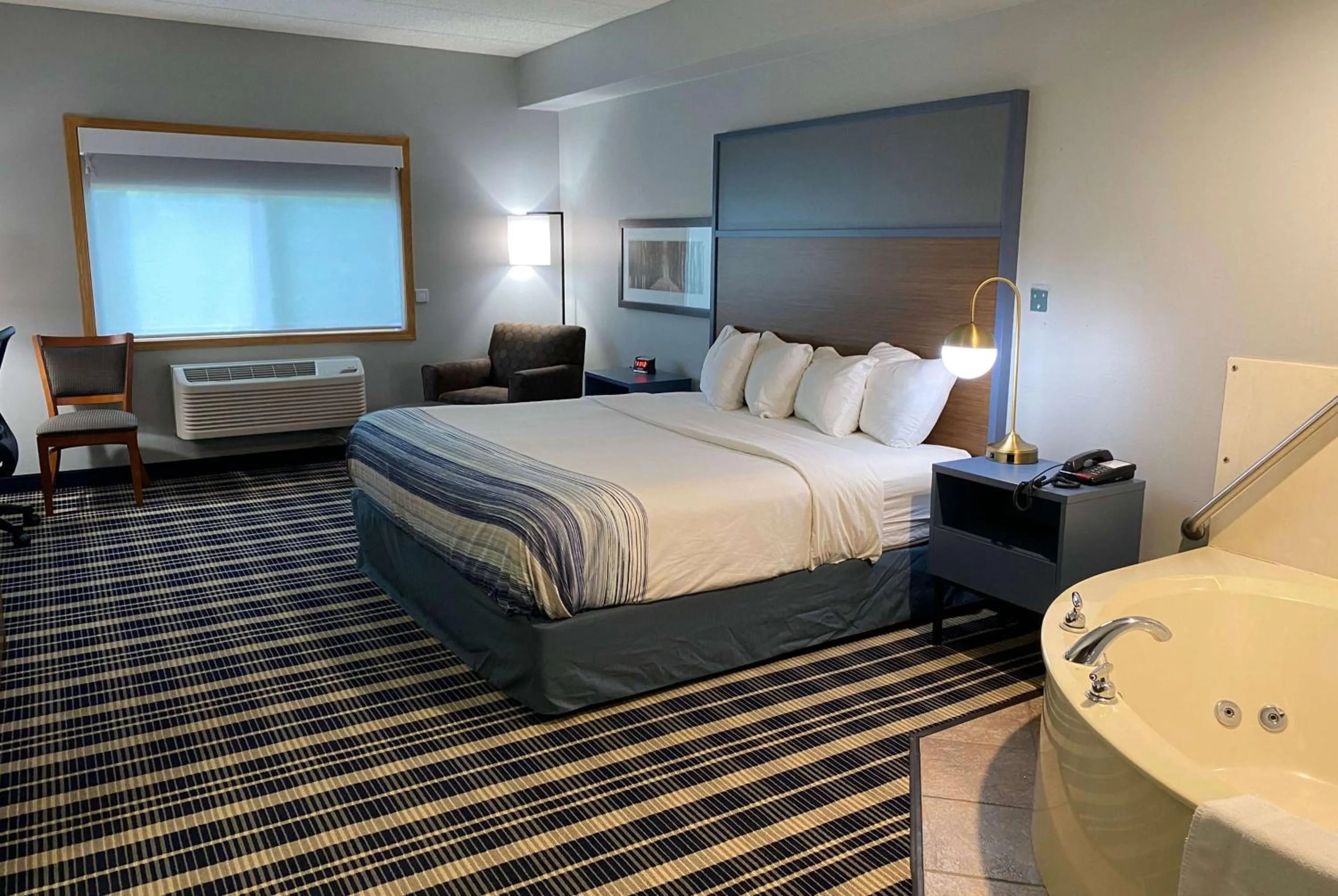 Photo of the whole room, Bed in AmericInn by Wyndham Chanhassen