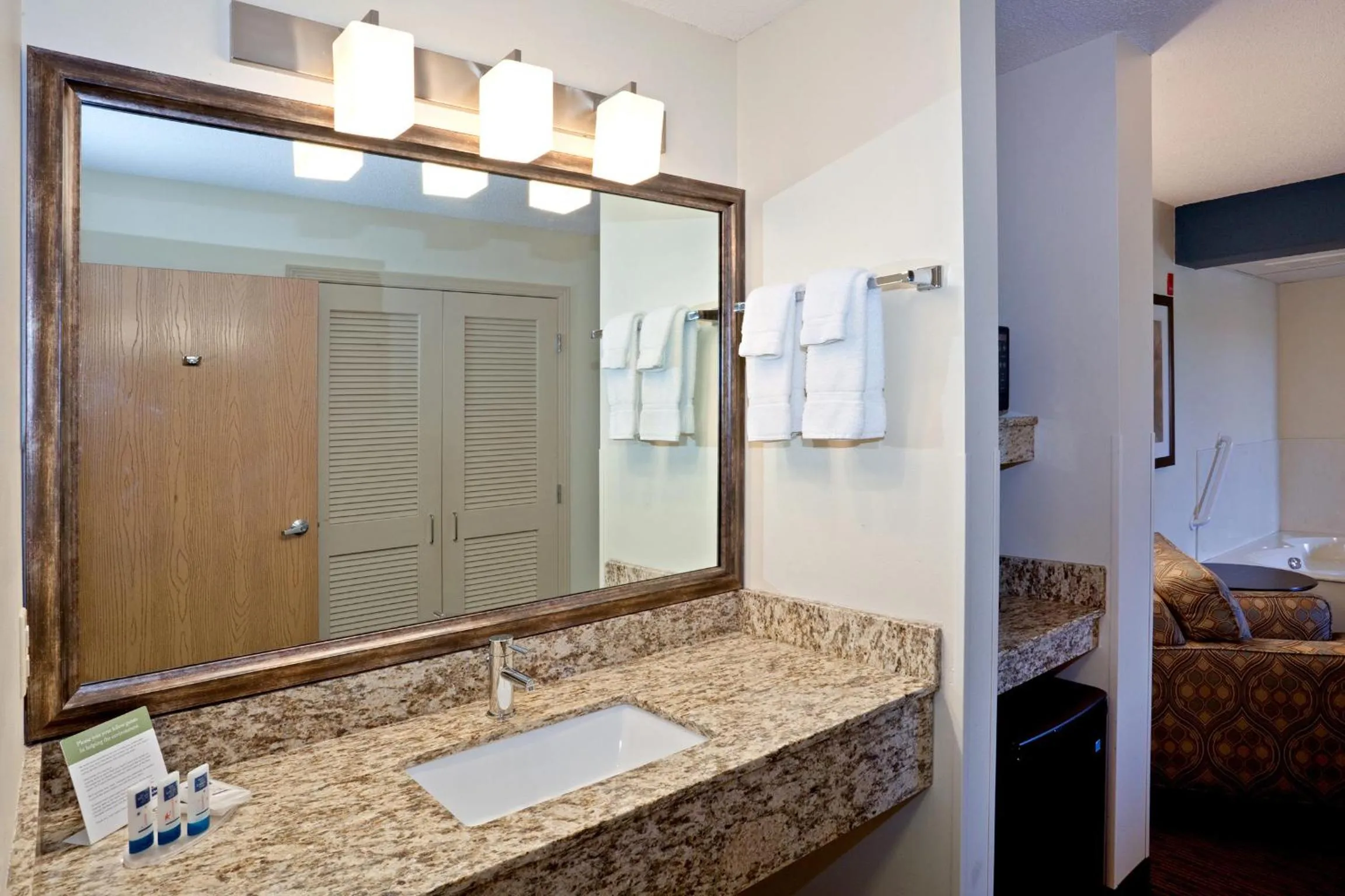 Bathroom in AmericInn by Wyndham Chanhassen