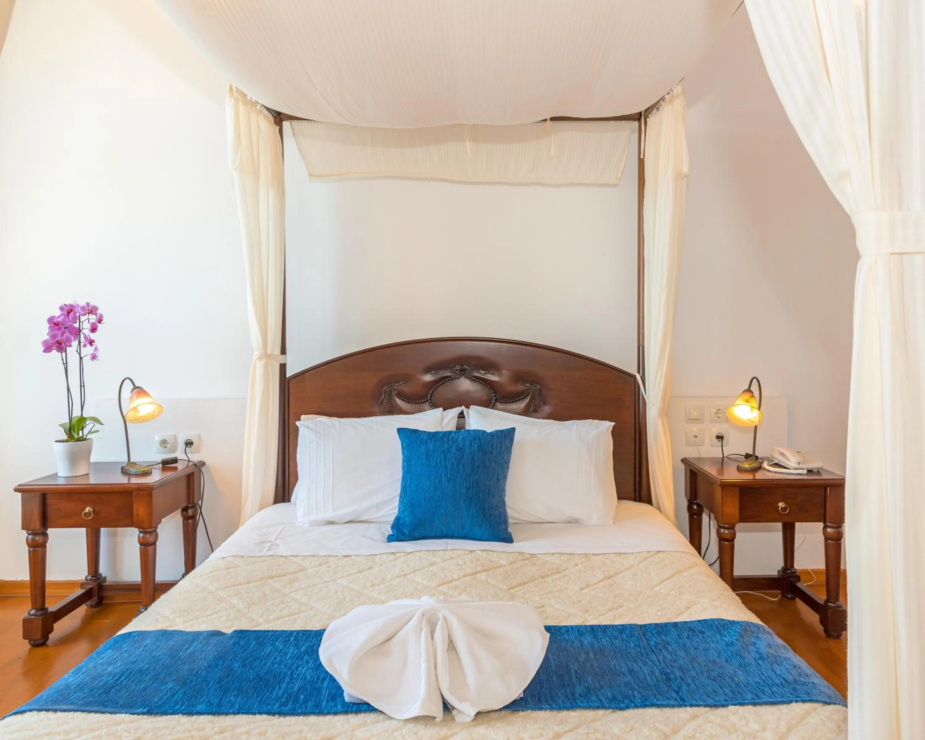 Bed in Hotel Amphora