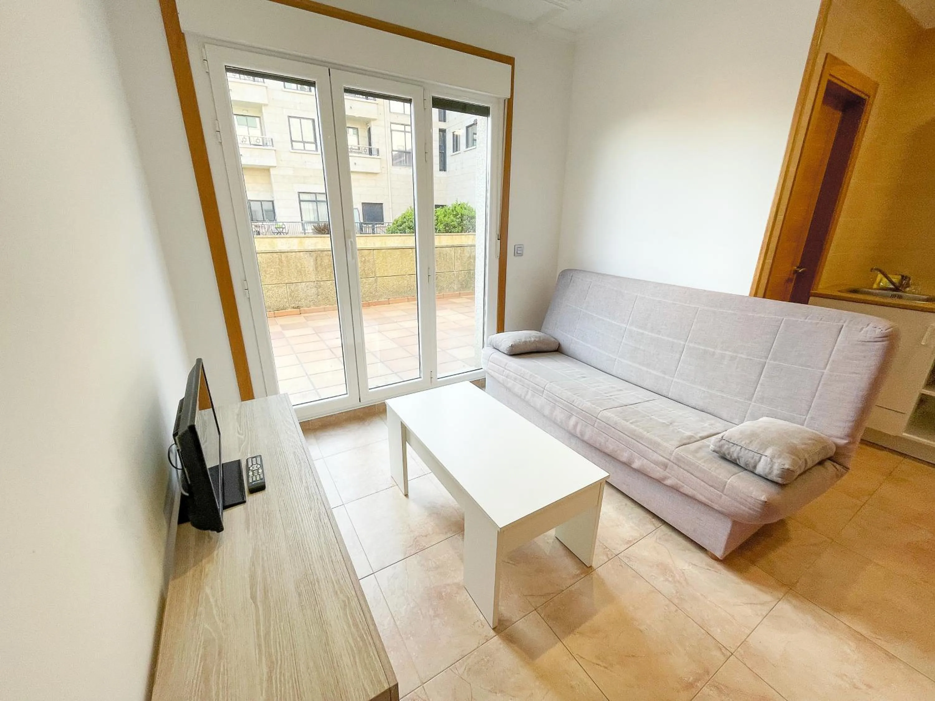 TV and multimedia in Apartamentos Revolta Sanxenxo 3000