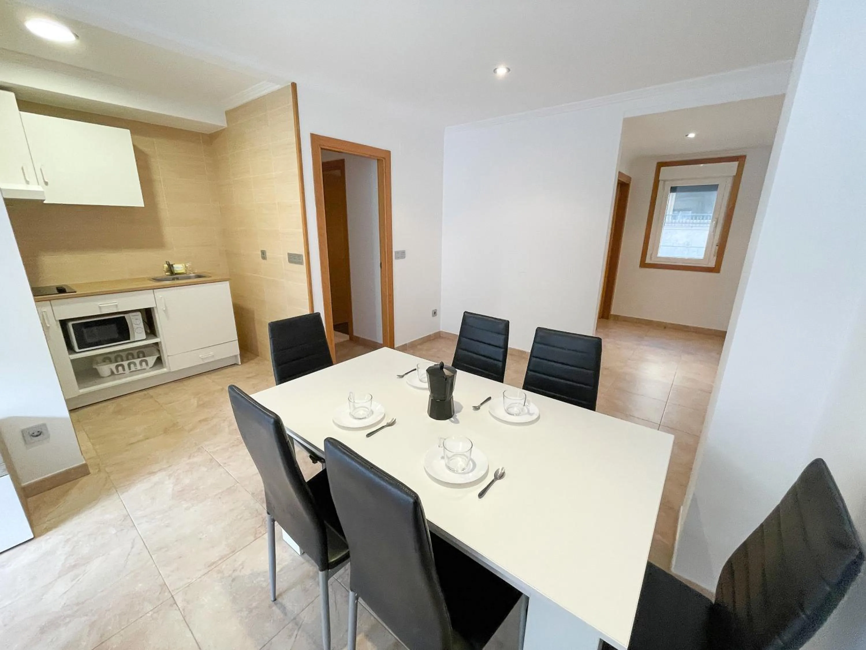 Kitchen or kitchenette in Apartamentos Revolta Sanxenxo 3000