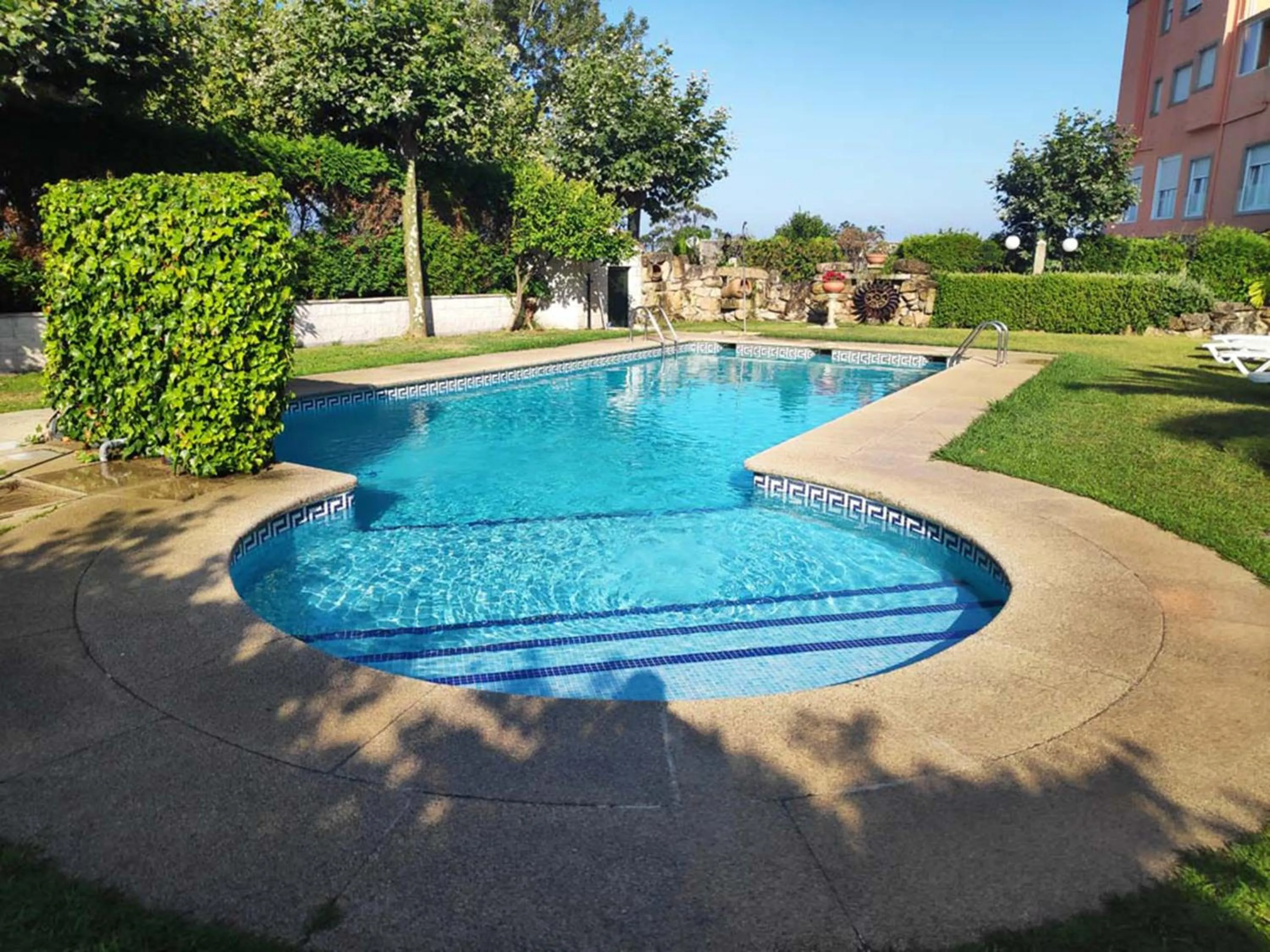 Swimming pool in Apartamentos Revolta Sanxenxo 3000