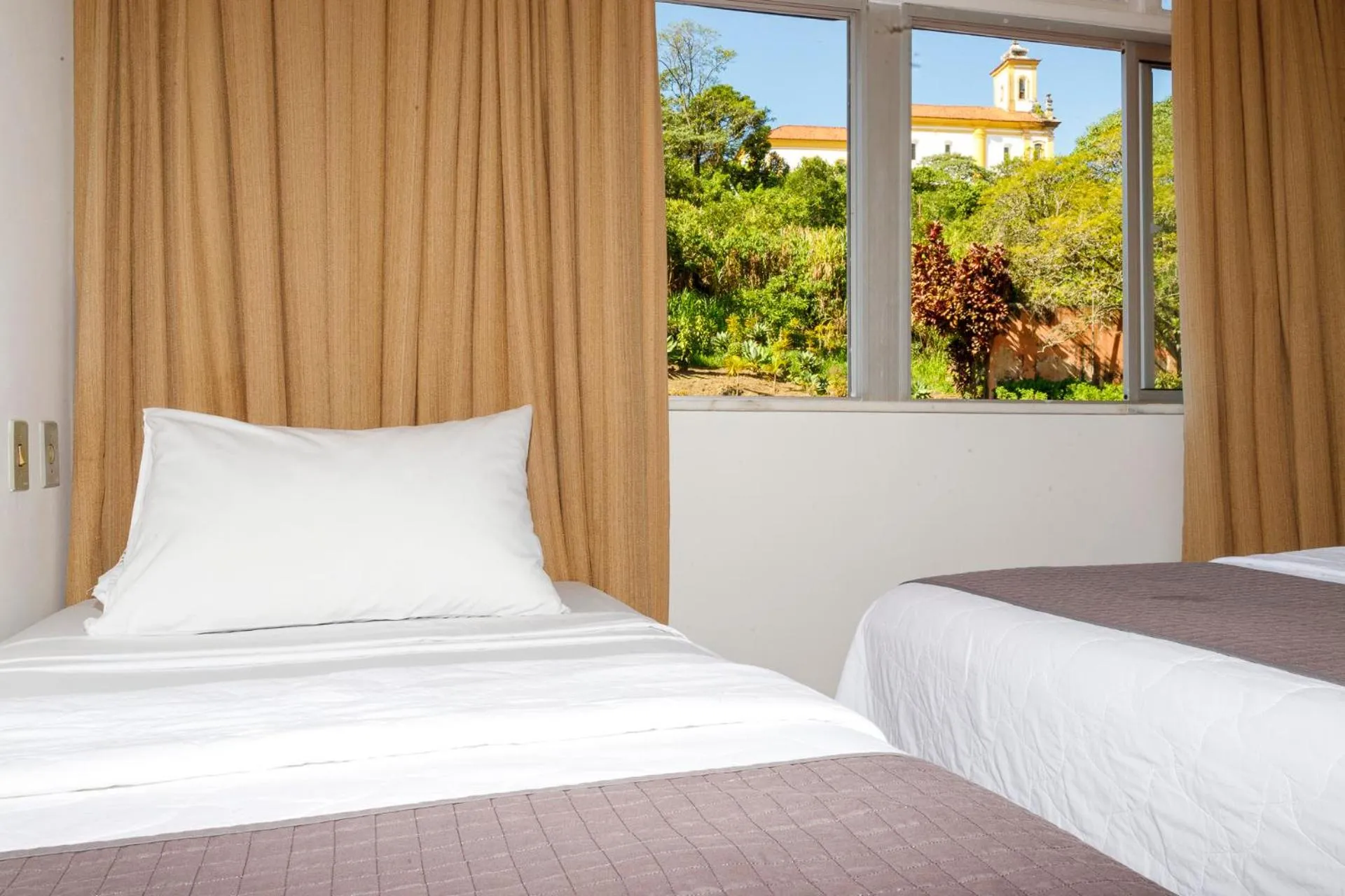 Bed in Grande Hotel de Ouro Preto - 80 ANOS