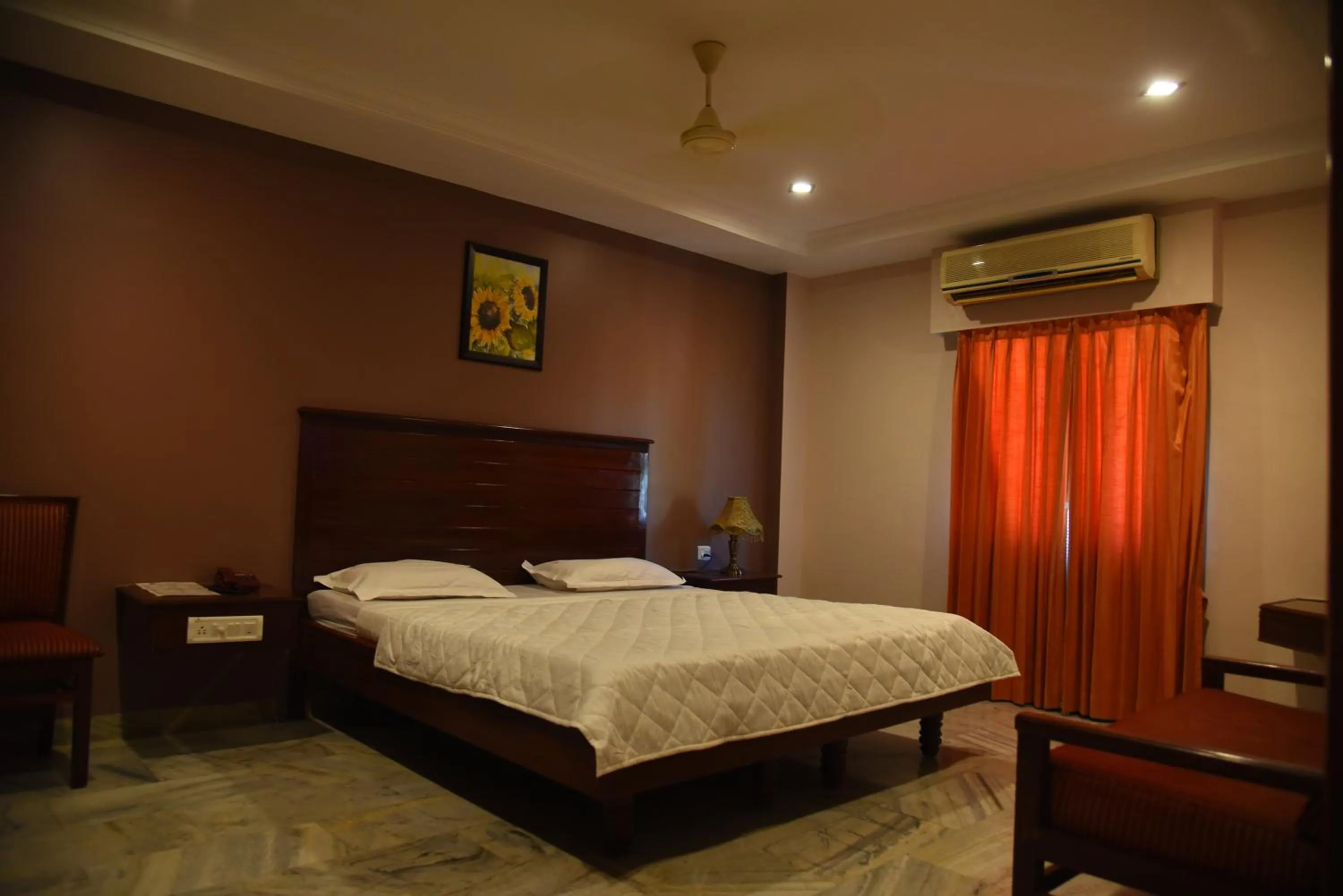 Bed in Hotel Subhalakshmi Palace