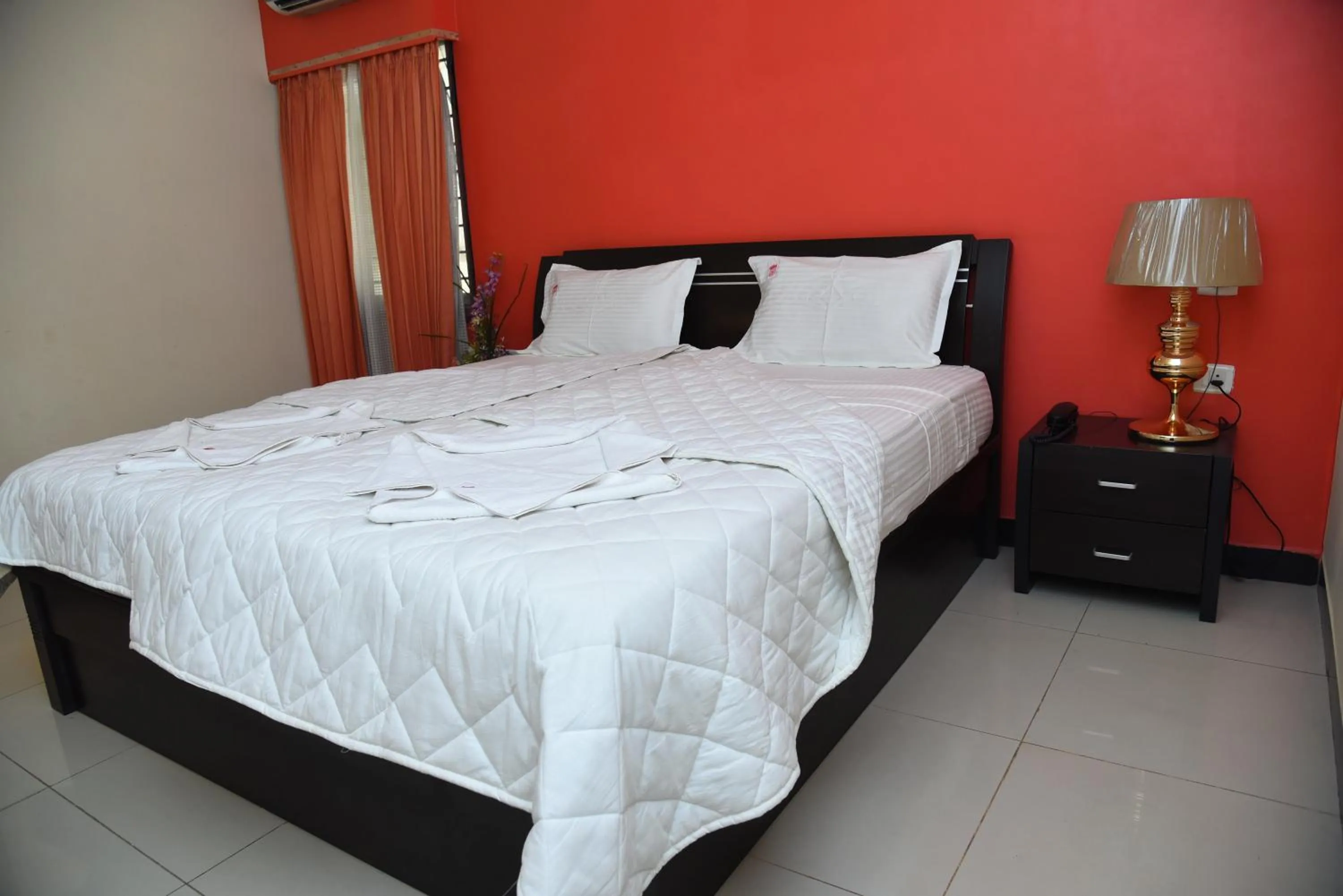 Bed in Hotel Subhalakshmi Palace