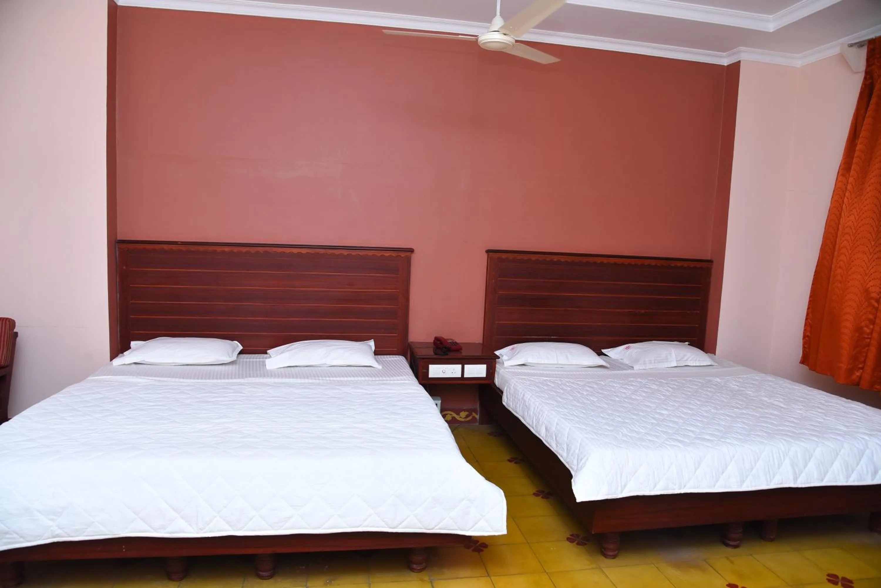 Bed in Hotel Subhalakshmi Palace
