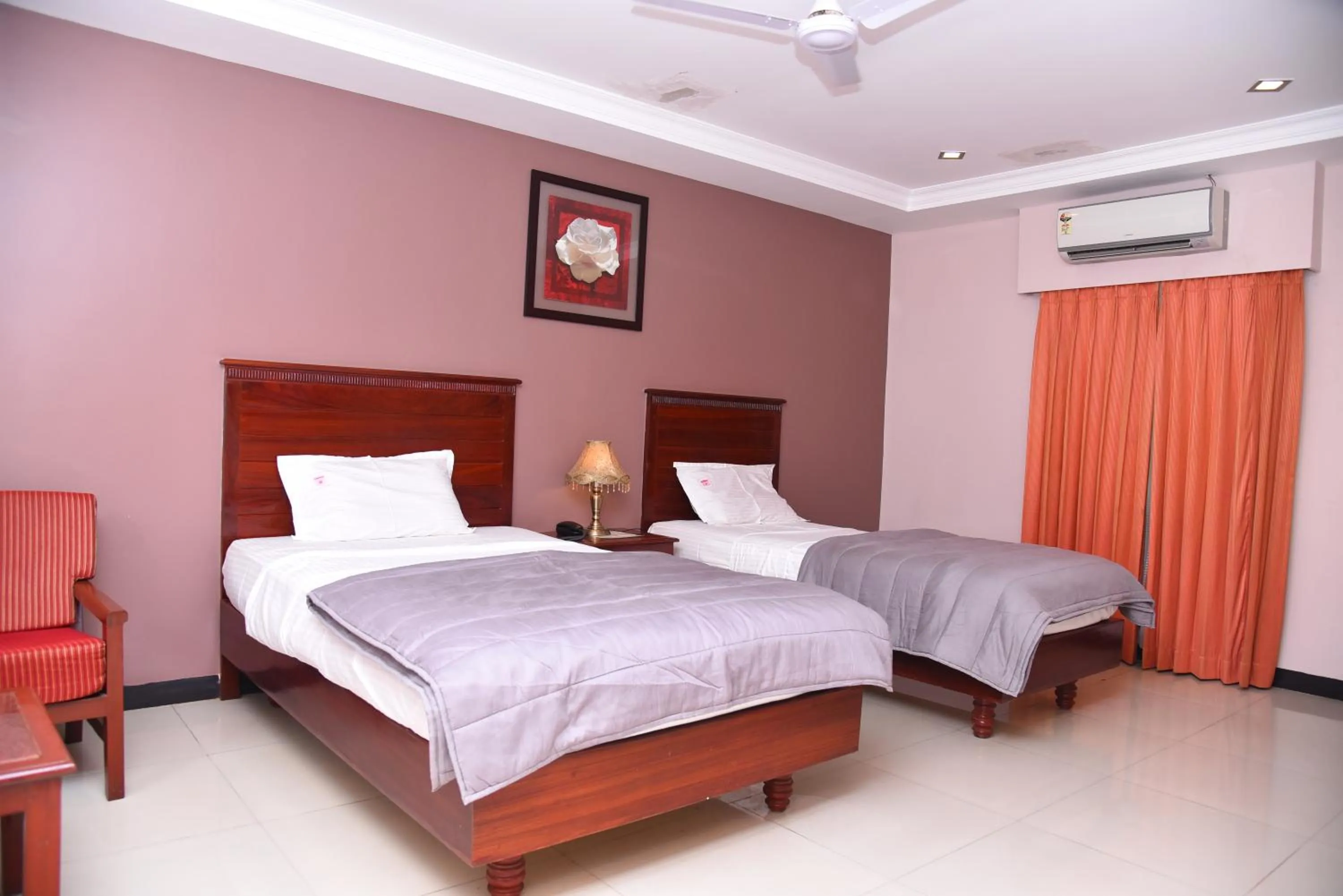 Bed in Hotel Subhalakshmi Palace