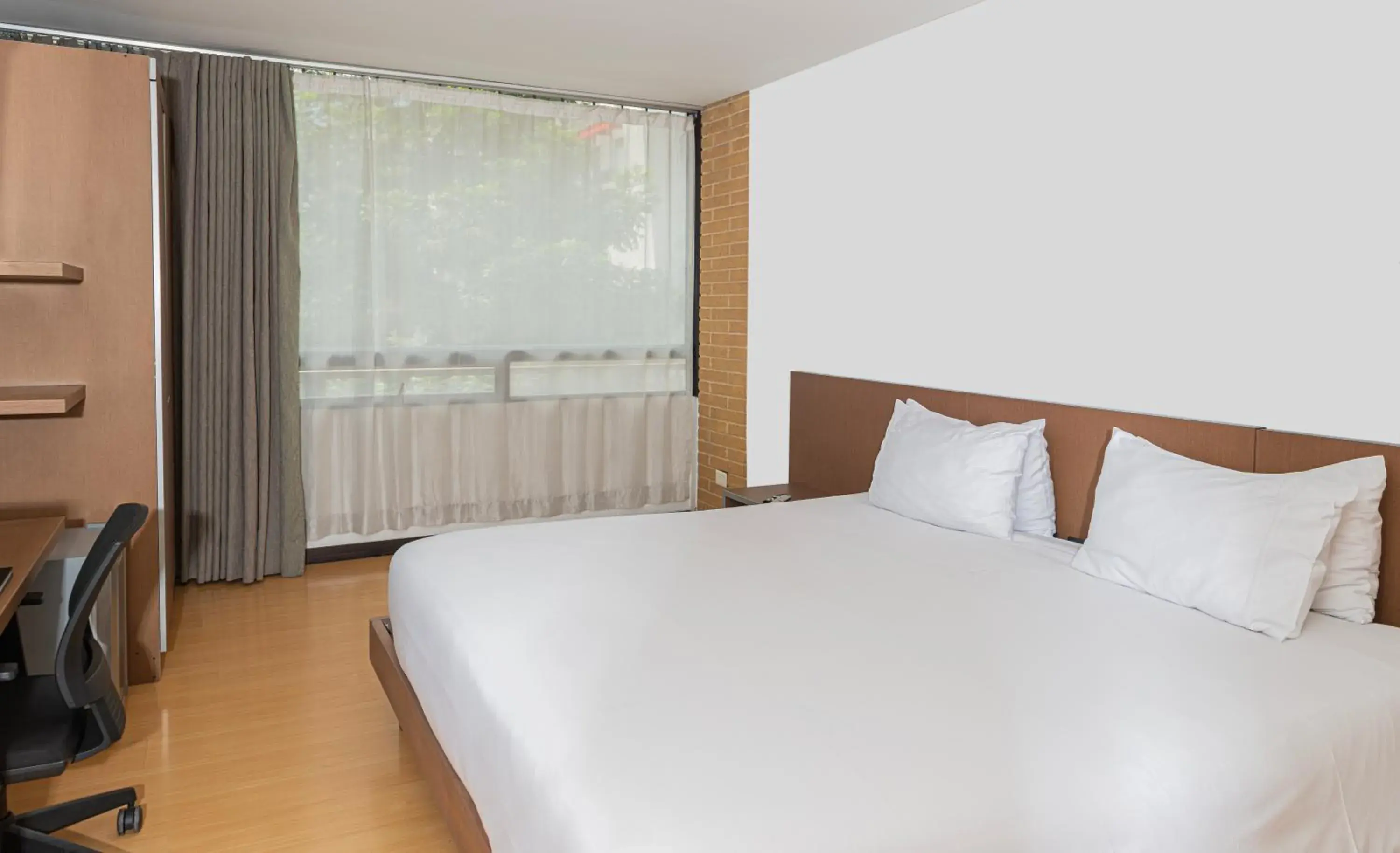 Bed in Hotel Viaggio Nueve Tres Bed in Hotel Viaggio Nueve Tres