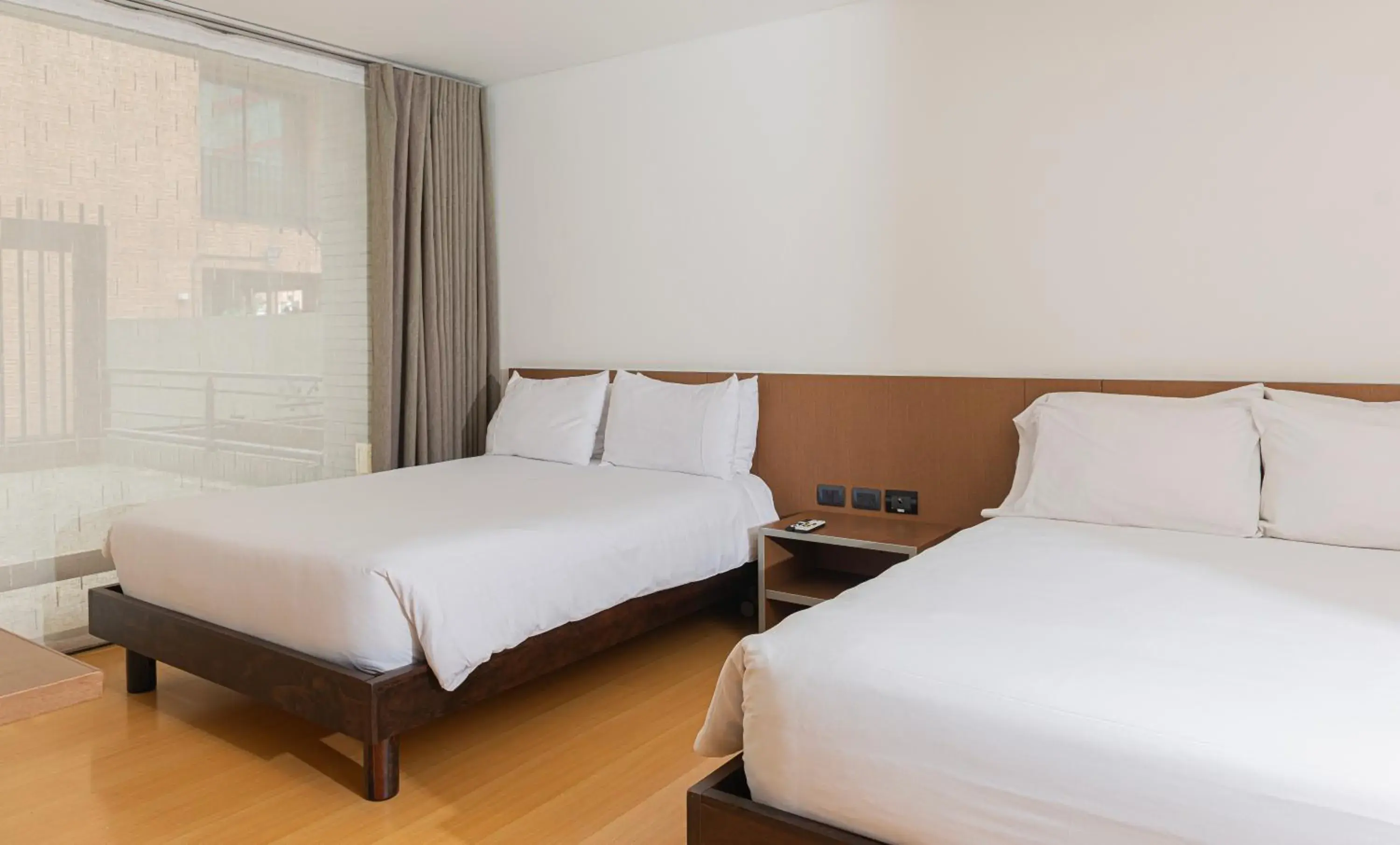 Bed in Hotel Viaggio Nueve Tres Bed in Hotel Viaggio Nueve Tres