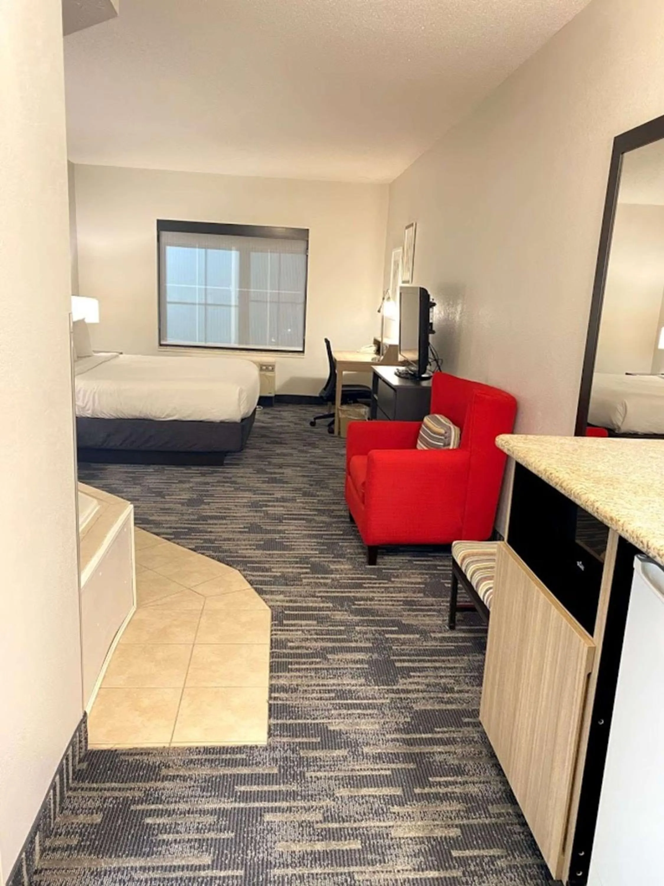 Bedroom in Country Inn & Suites by Radisson, Queensbury - Lake George , NY