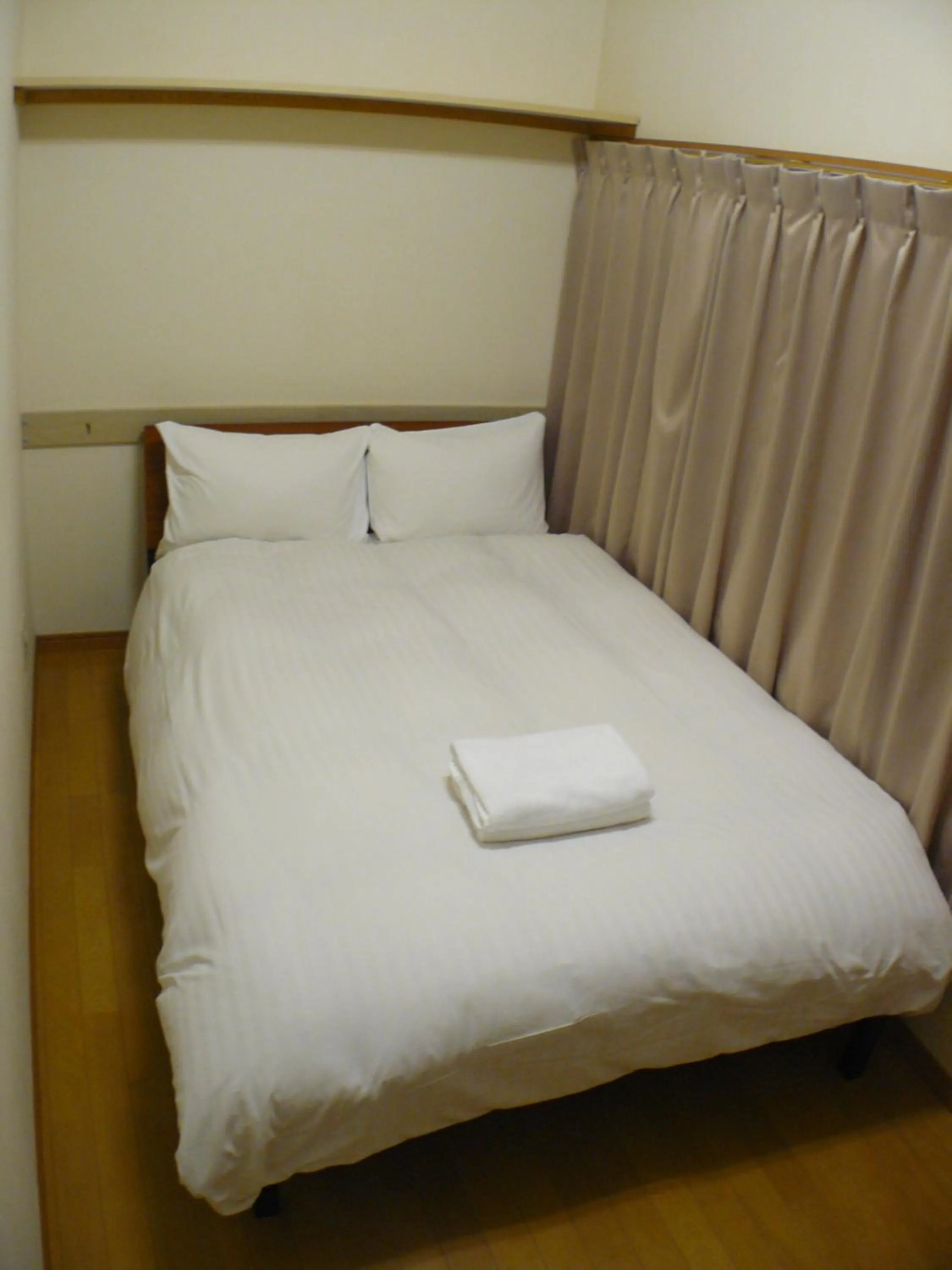 Bed in Hotel Meigetsu