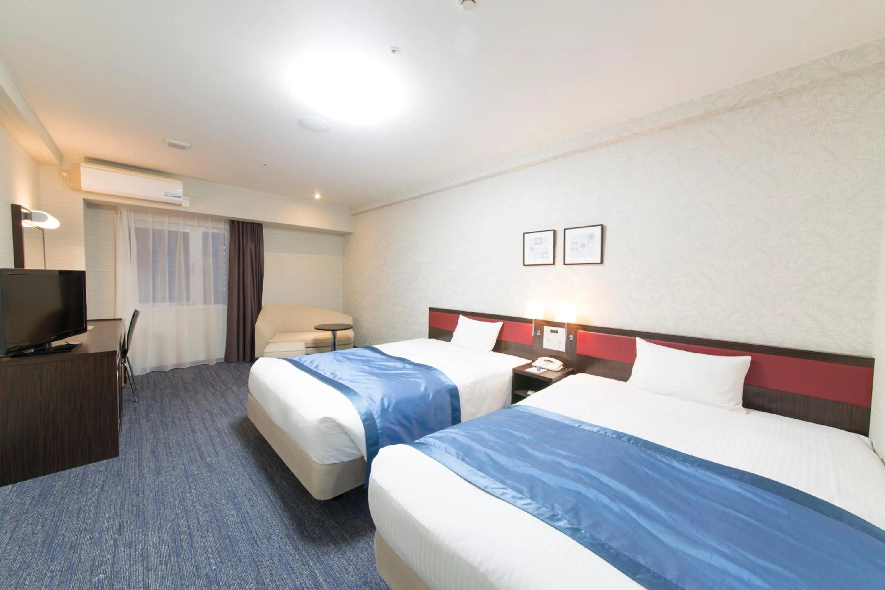 Photo of the whole room, Bed in Hotel Hokke Club Shonan Fujisawa