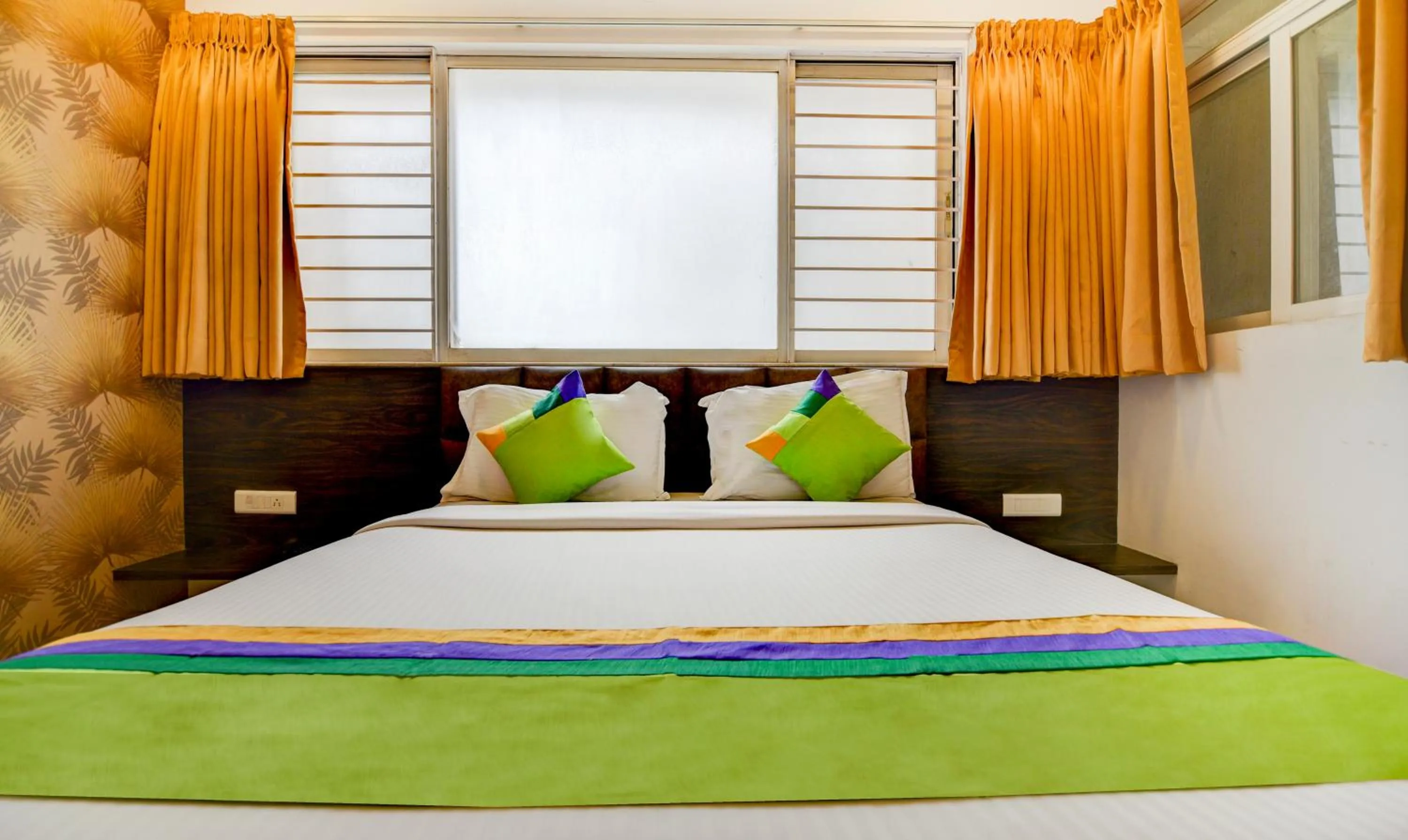 Bed in Treebo Kuval Inn