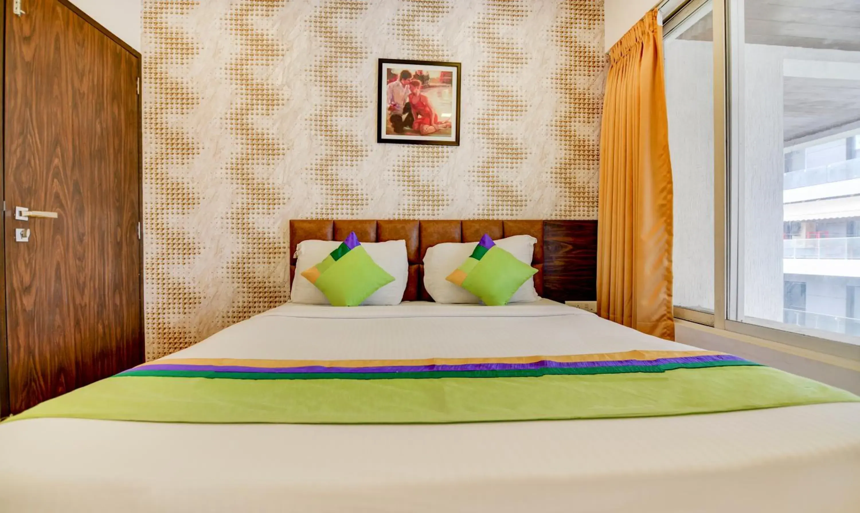 Bed in Treebo Kuval Inn Bed in Treebo Kuval Inn