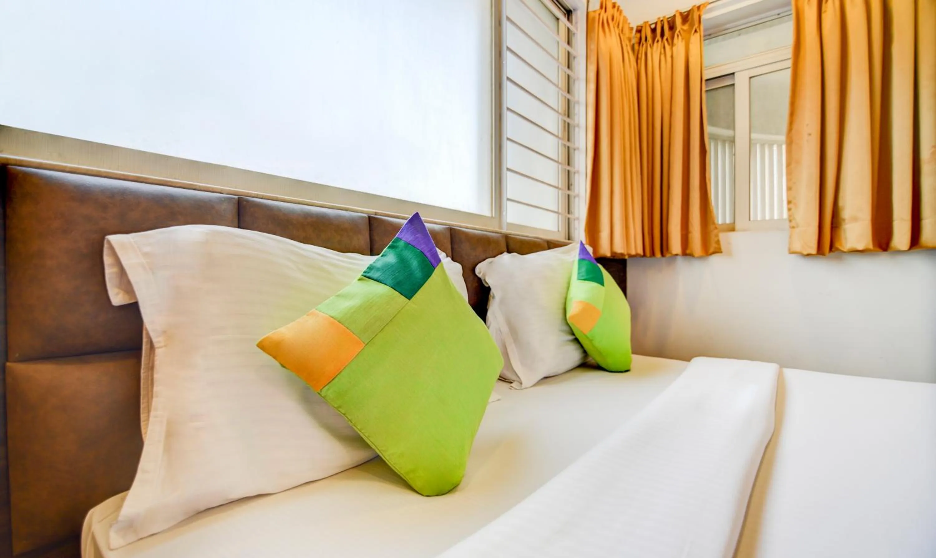 Bed in Treebo Kuval Inn