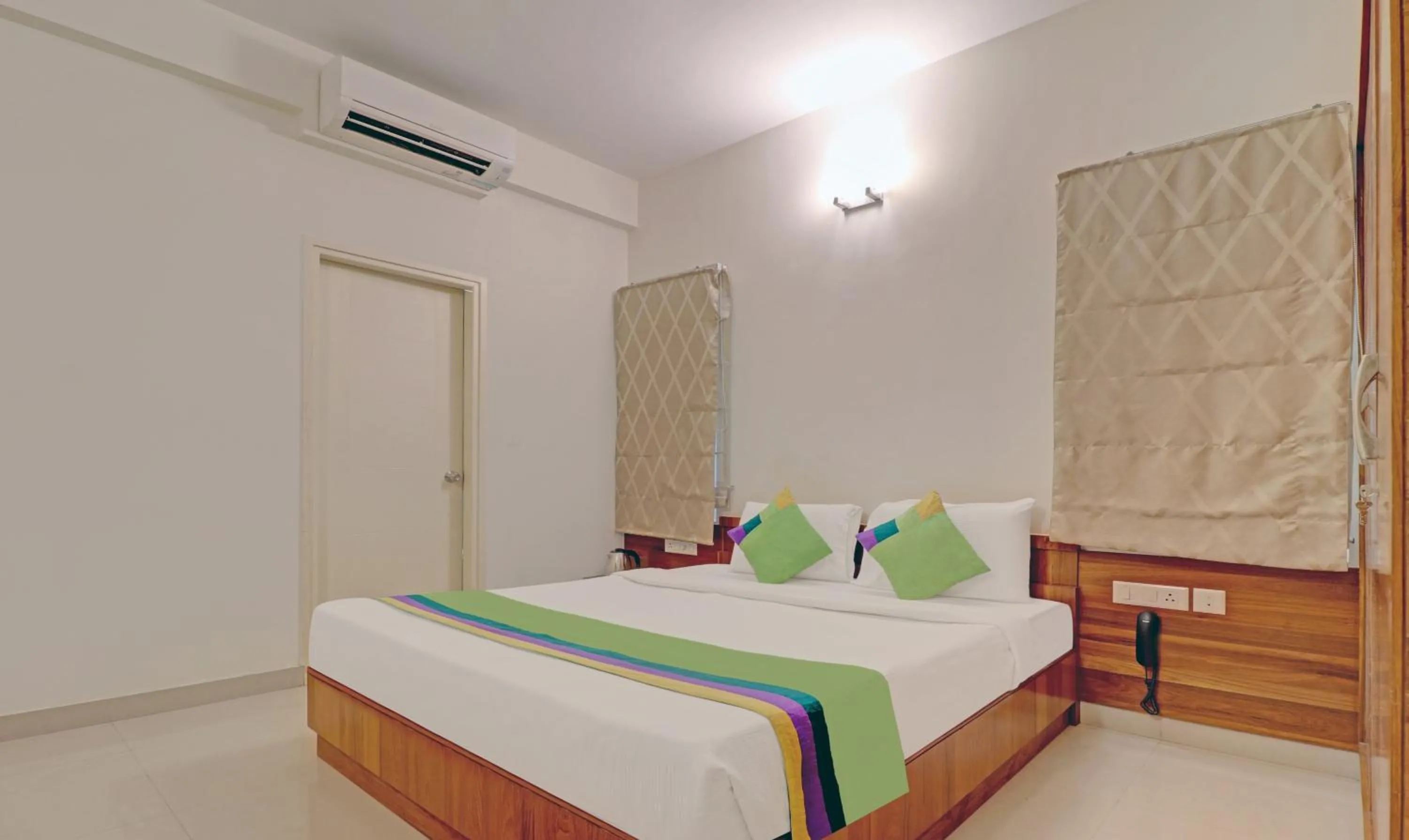 Bed in Treebo Kings Suits, HSR Layout