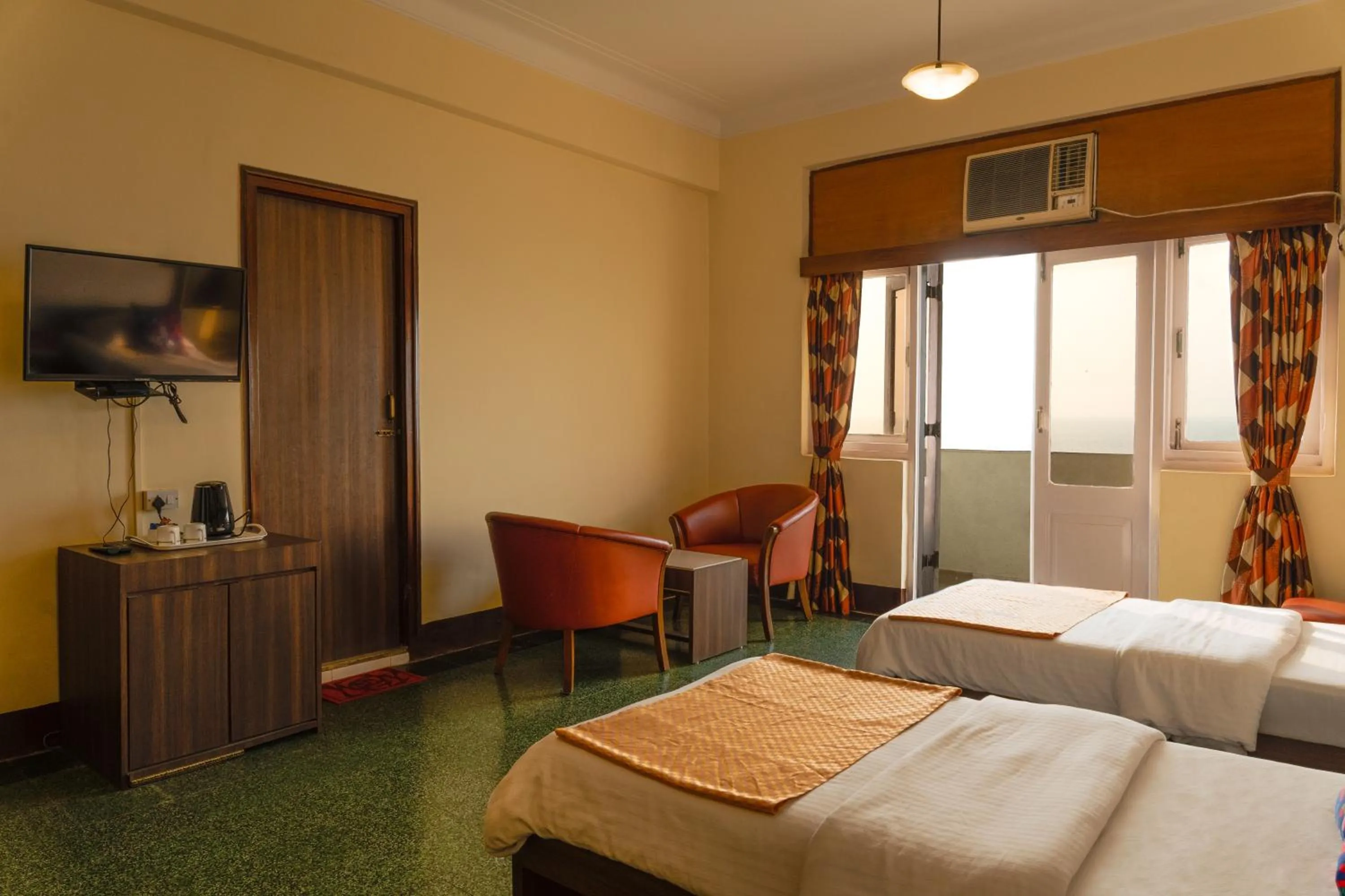 Photo of the whole room, Bed in Sea Green South Hotel