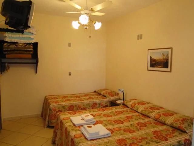 Bed in Pousada Martinez
