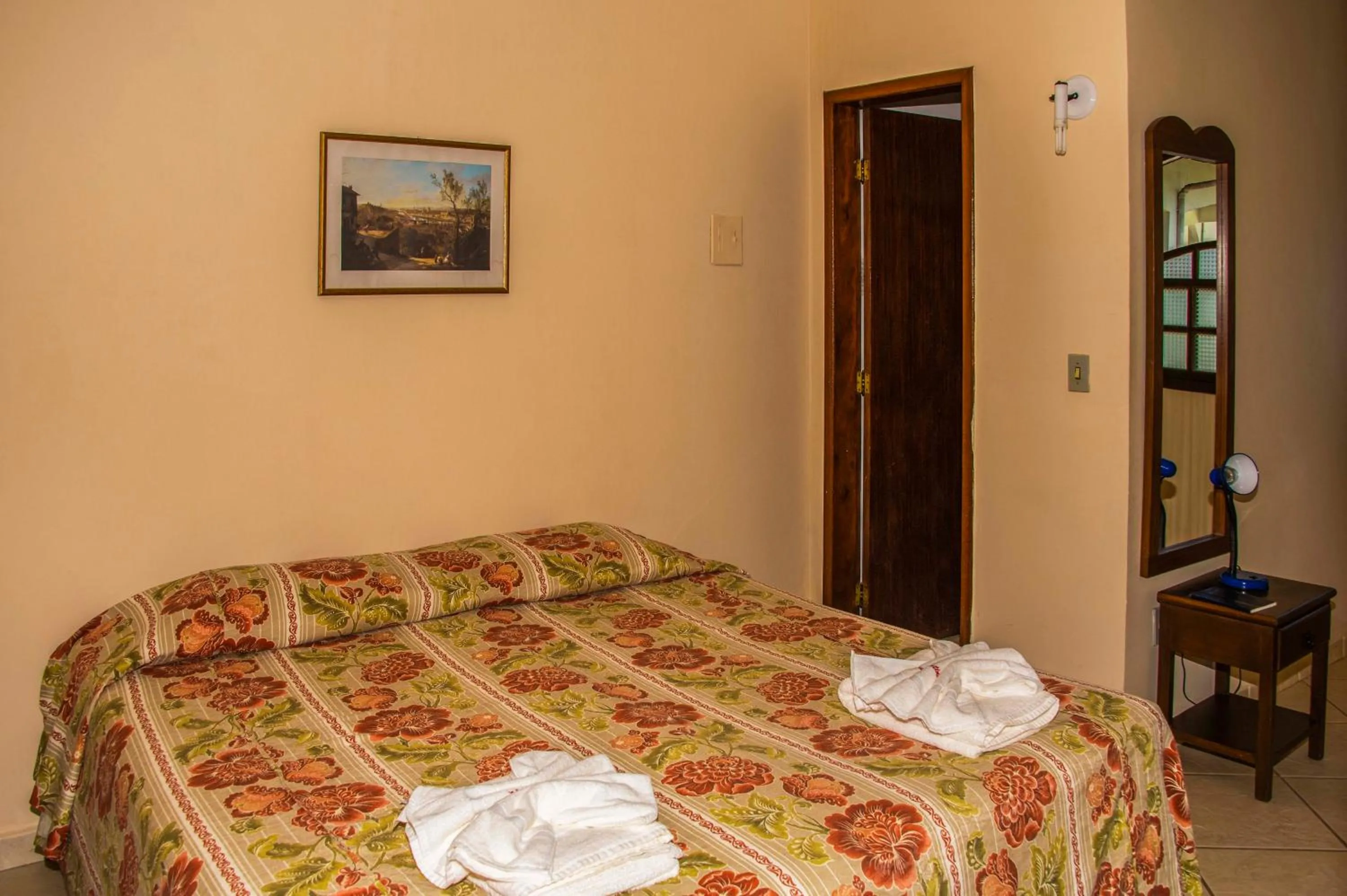 Bed in Pousada Martinez