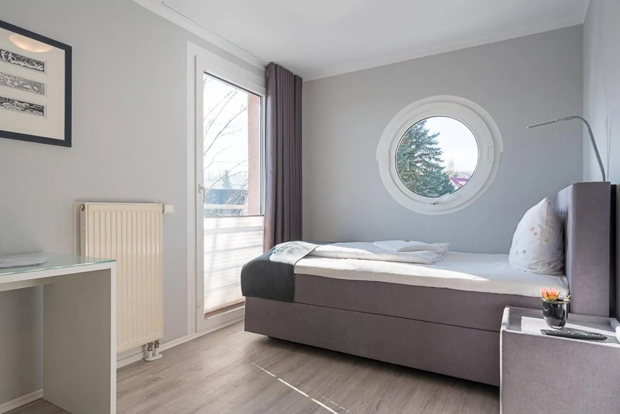 Photo of the whole room, Bed in BioHotel Kassel Wilhelmshöher Tor