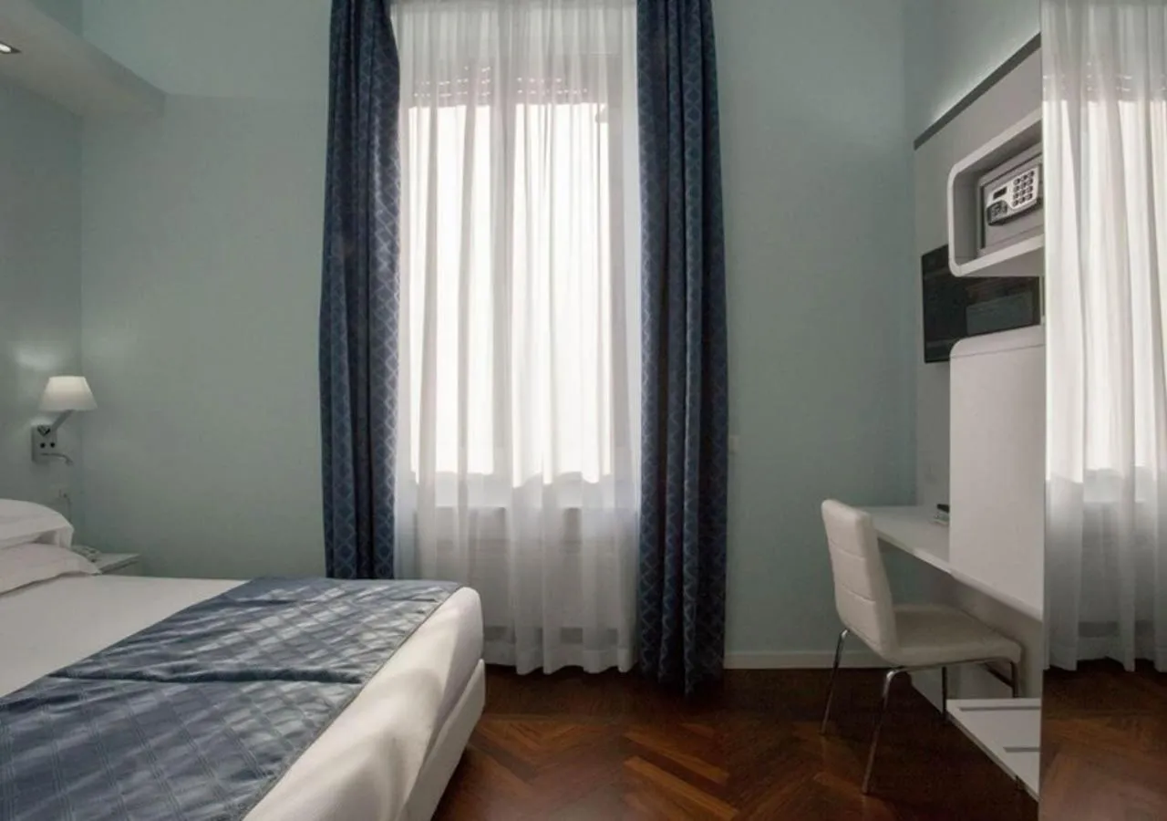 Photo of the whole room, Bed in Relais Villa Coppedè