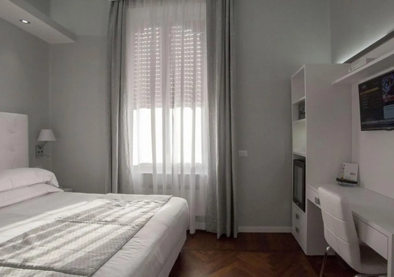 Photo of the whole room, Bed in Relais Villa Coppedè