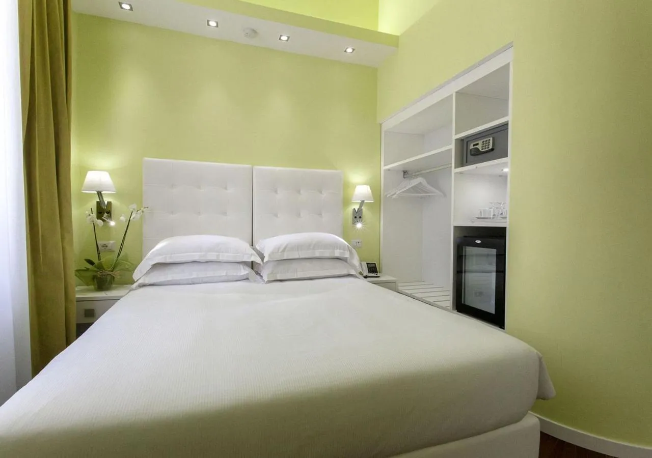 Photo of the whole room, Bed in Relais Villa Coppedè