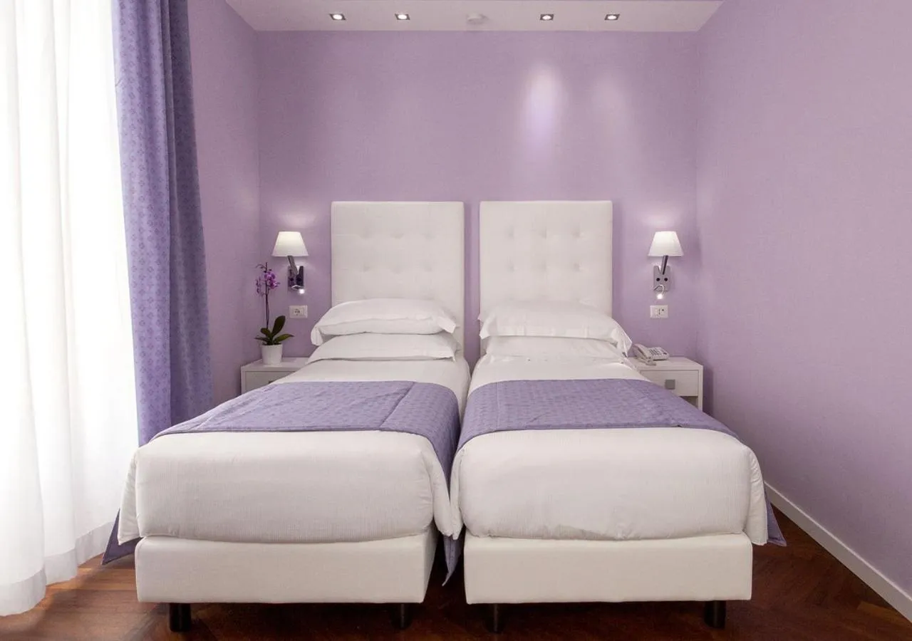 Photo of the whole room, Bed in Relais Villa Coppedè