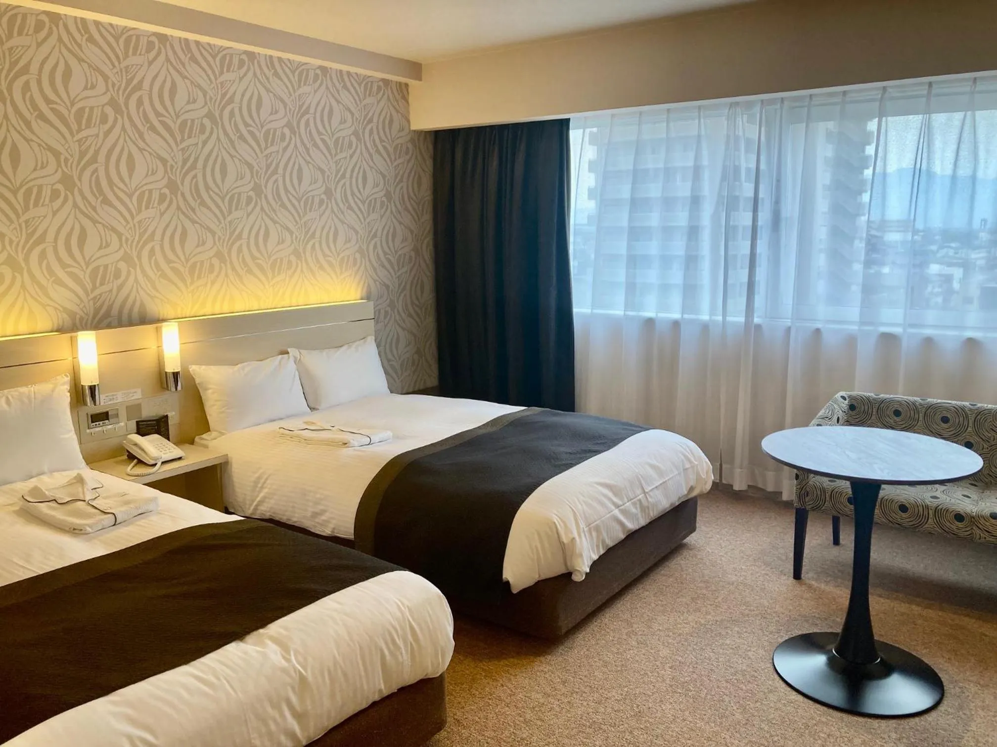 Bed in Kusatsu Estopia Hotel