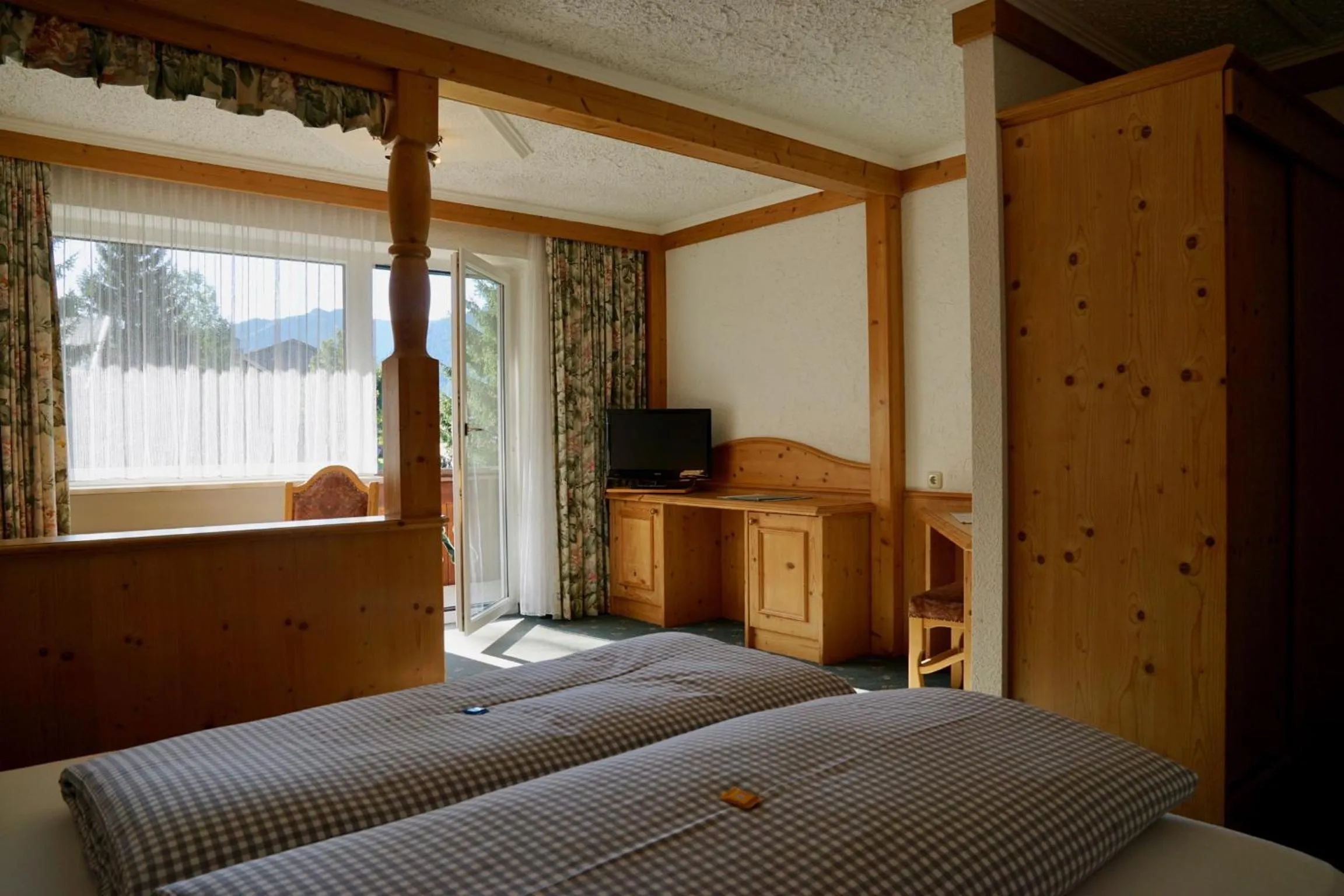 Bed in Garni Hotel Wildanger