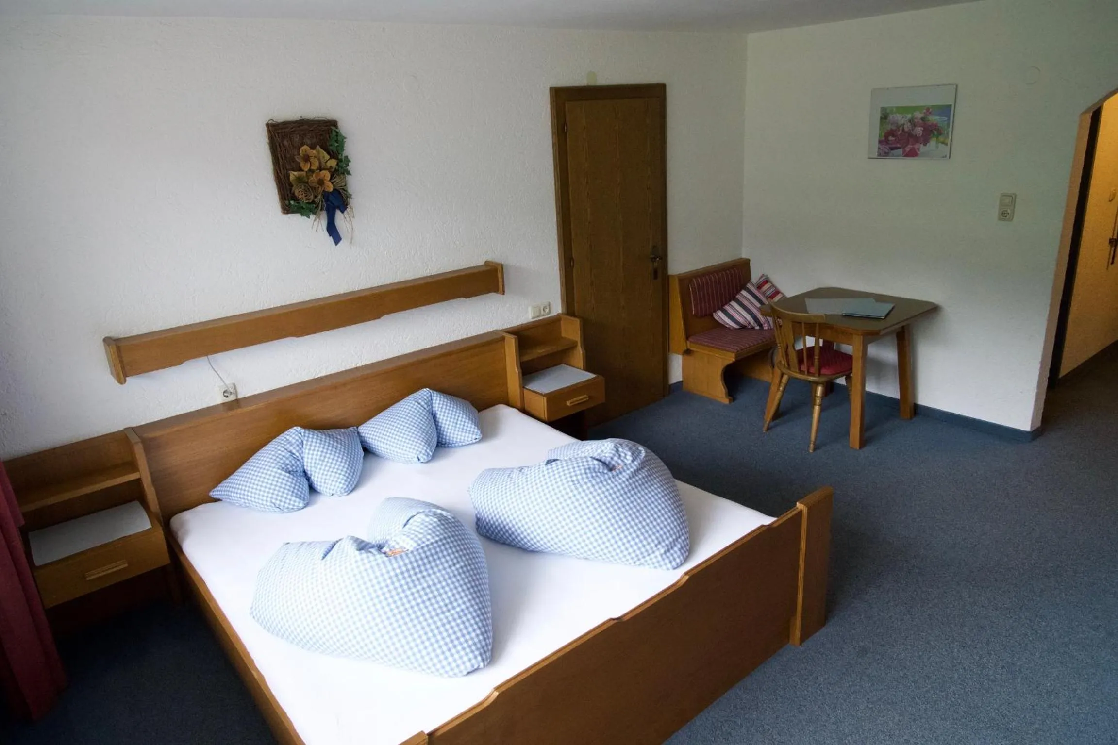 Bed in Garni Hotel Wildanger