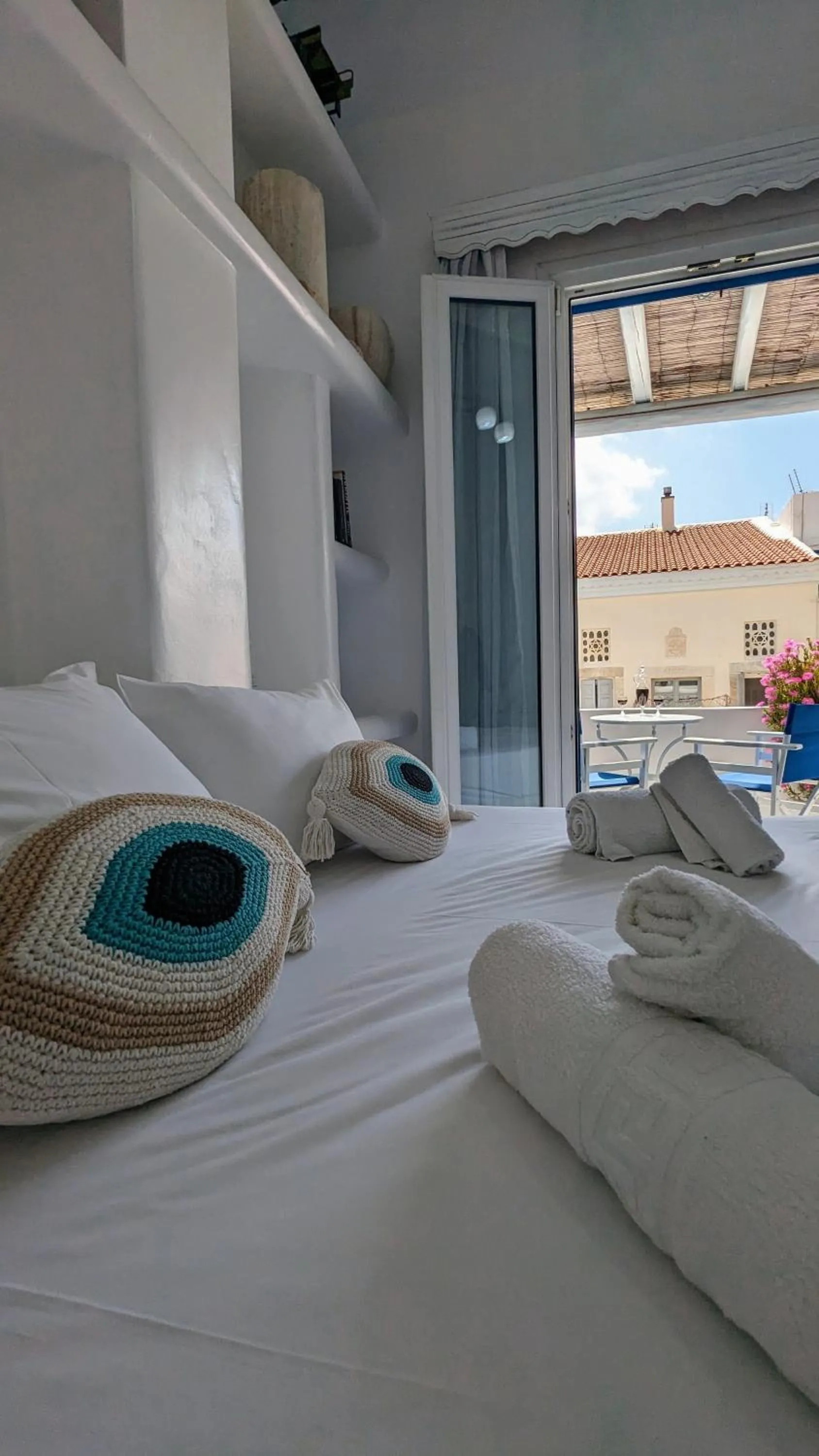 Bed in Anoi Rooms