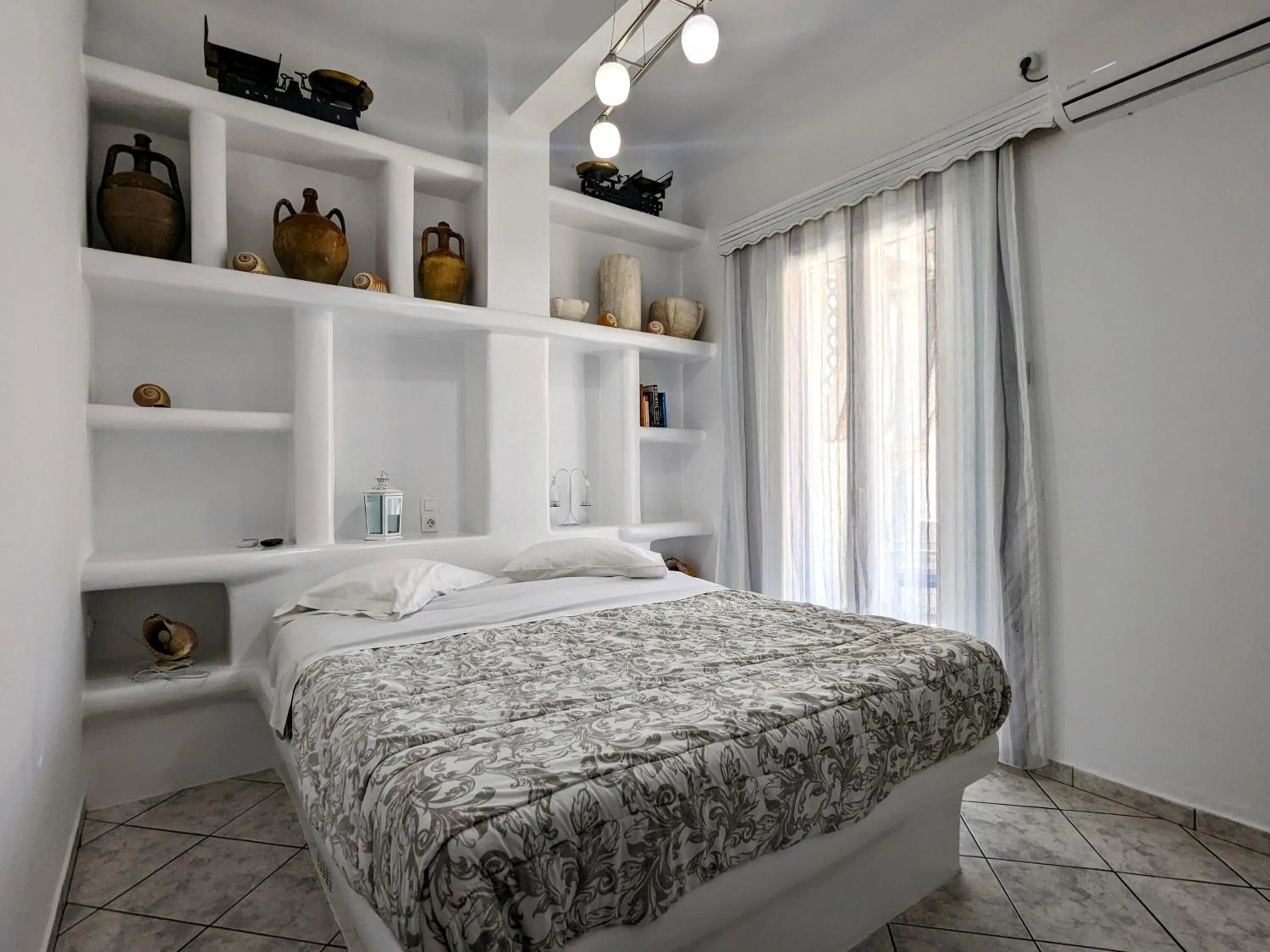 Bed in Anoi Rooms