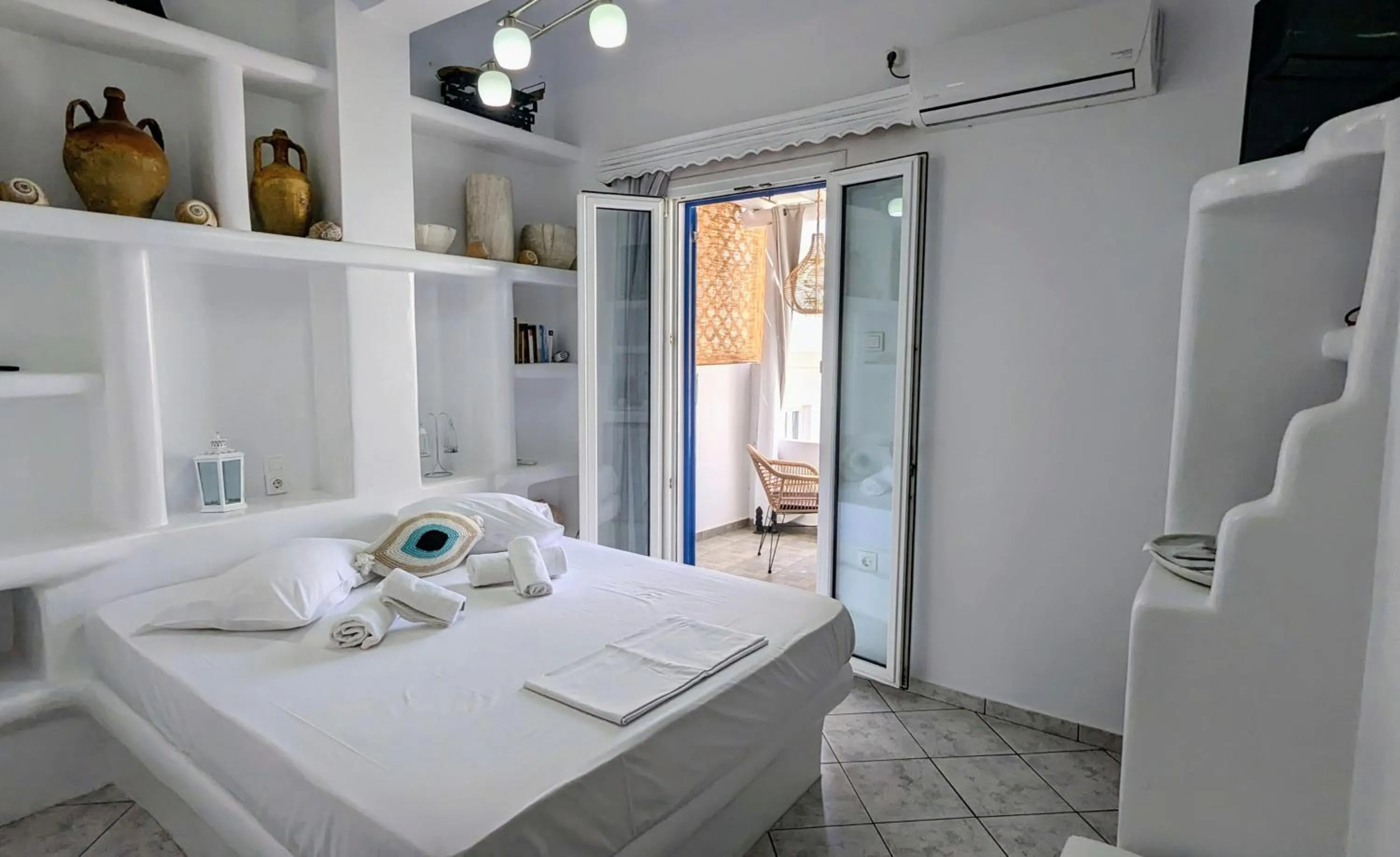 Bed in Anoi Rooms