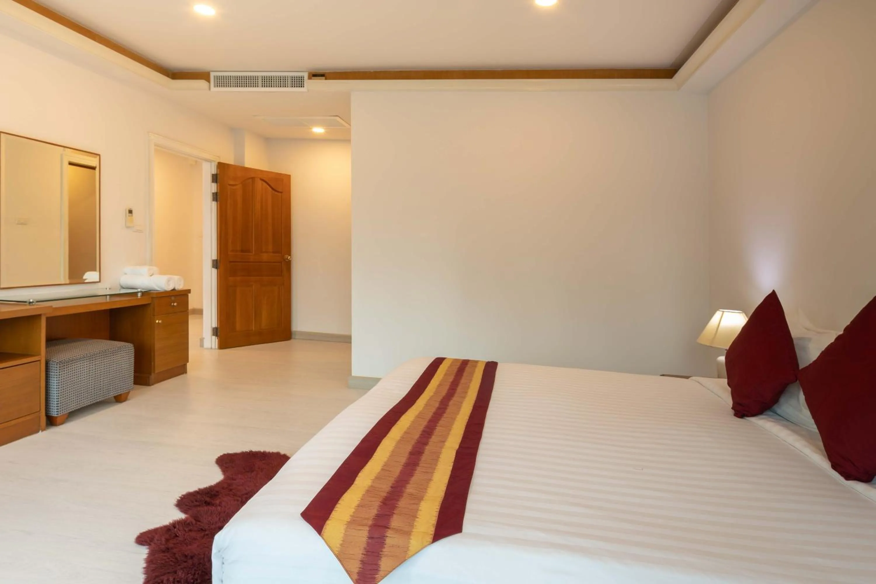 Bed in Chaidee Mansion