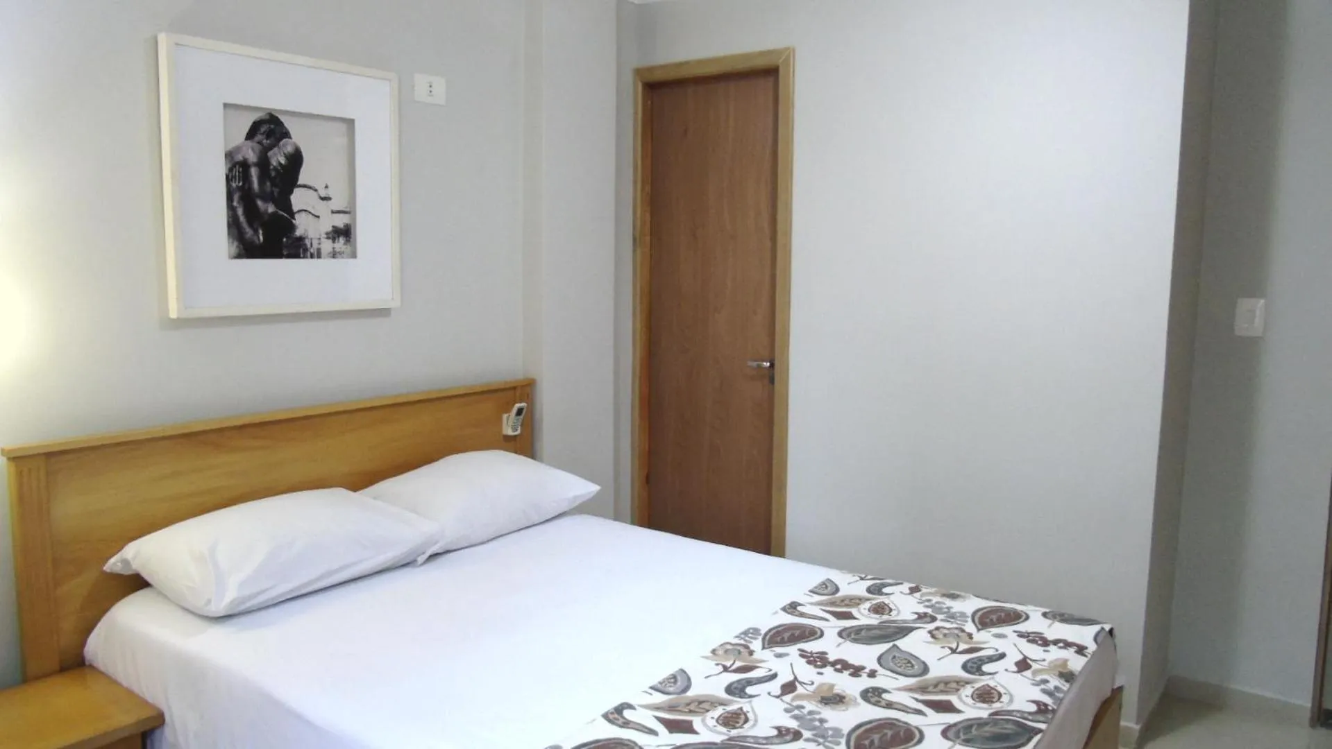 Bed in Paulista Garden Hotel