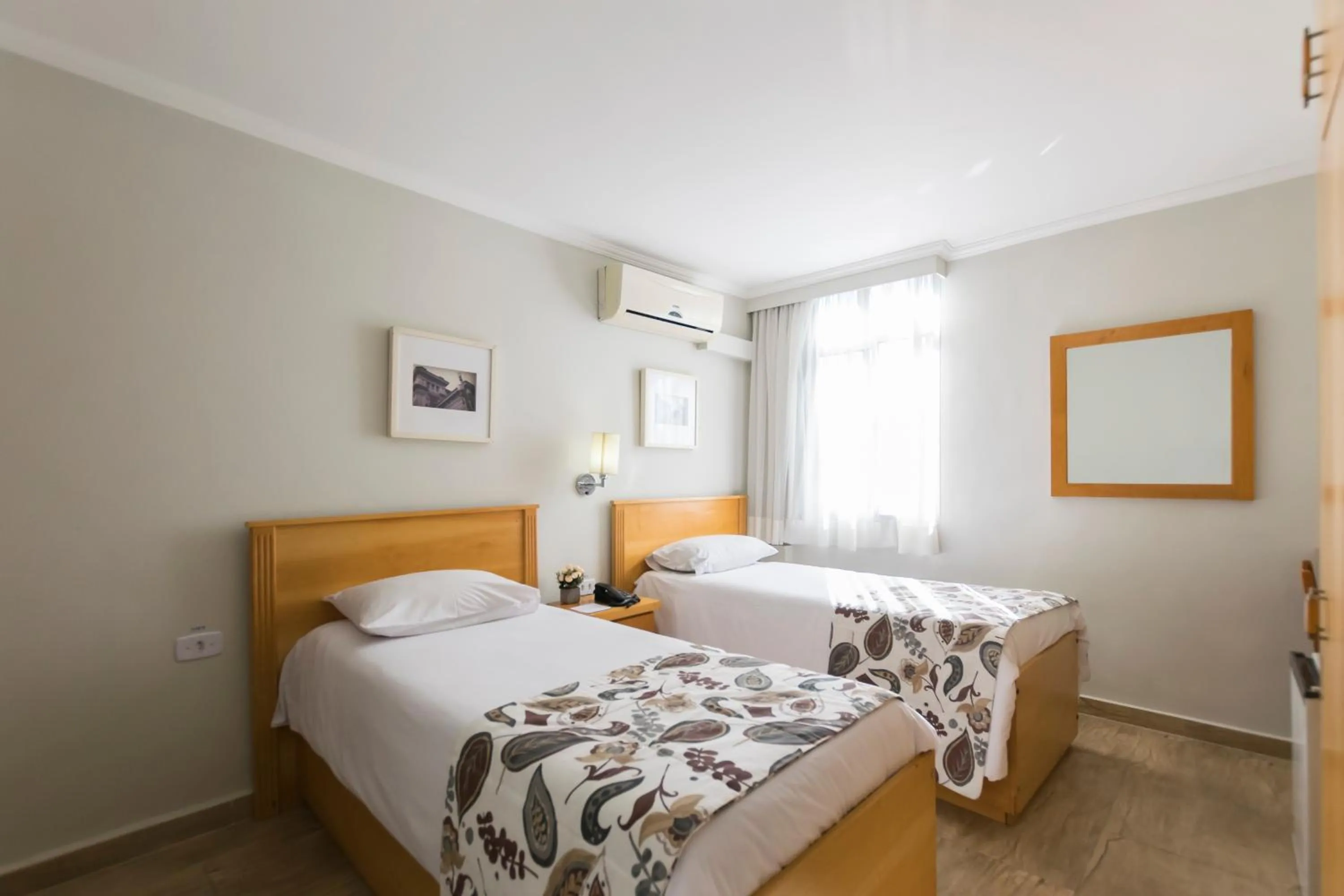 Bed in Paulista Garden Hotel