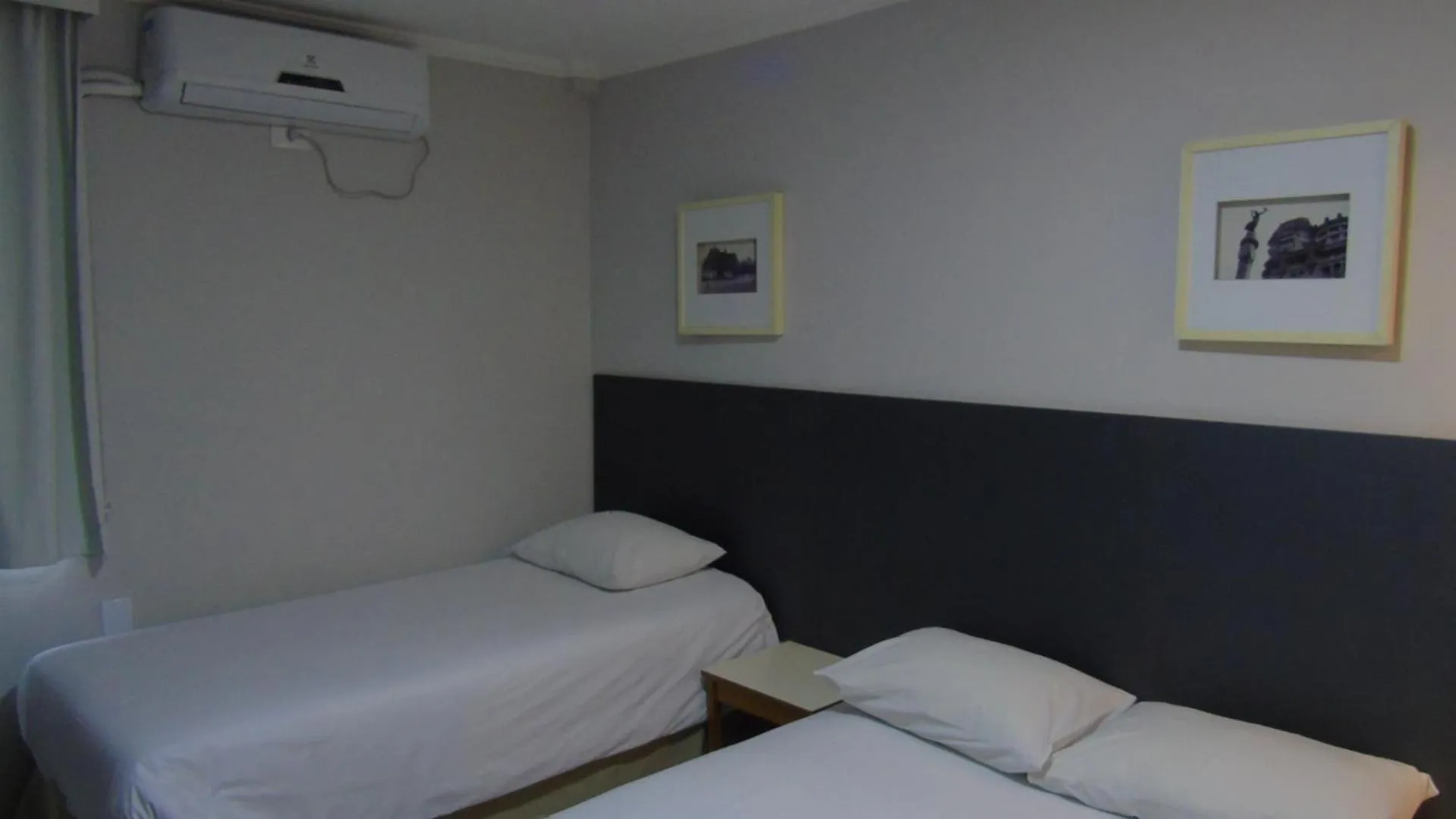 Bed in Paulista Garden Hotel