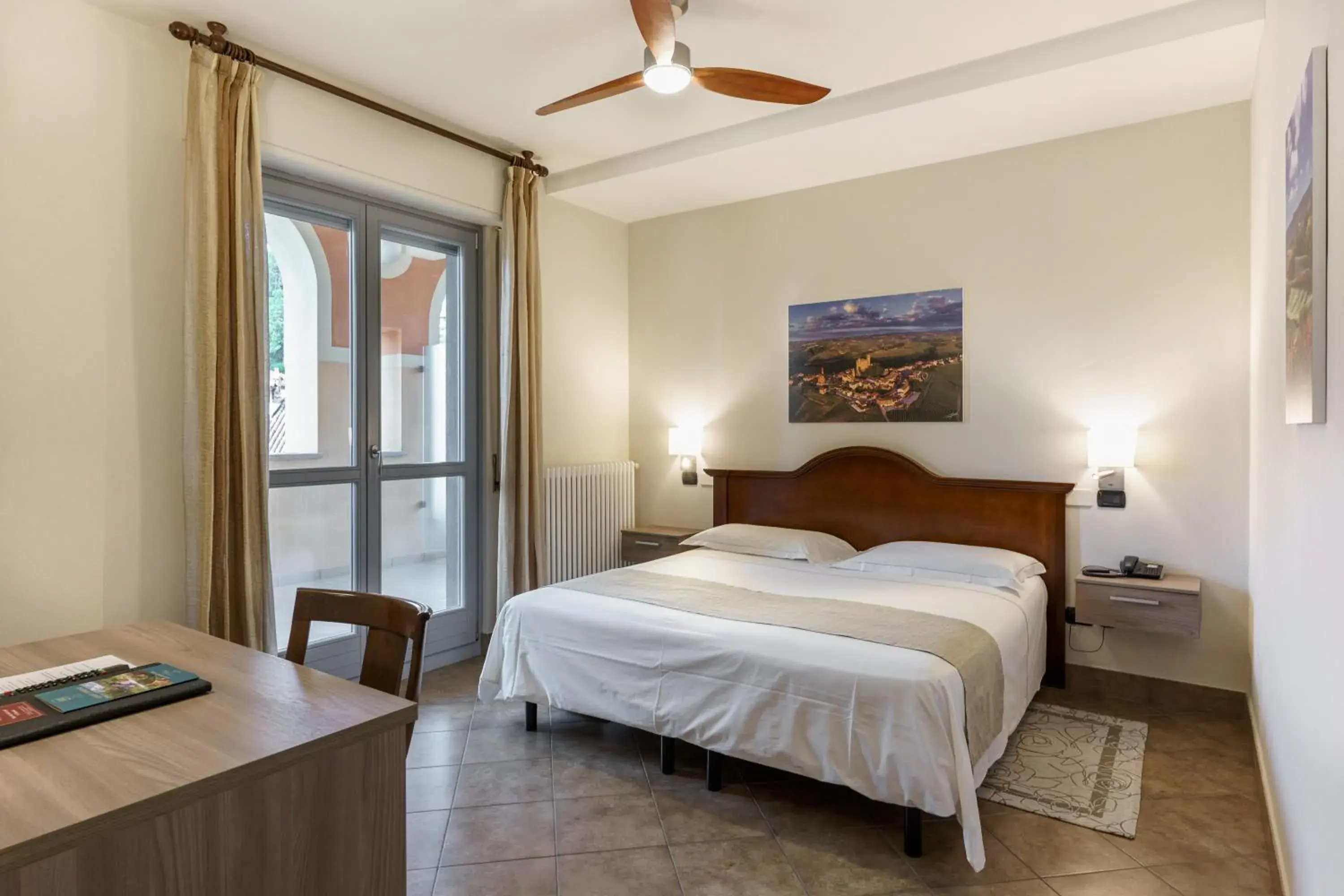 Photo of the whole room, Bed in Hotel Il Grappolo D'Oro Photo of the whole room, Bed in Hotel Il Grappolo D'Oro