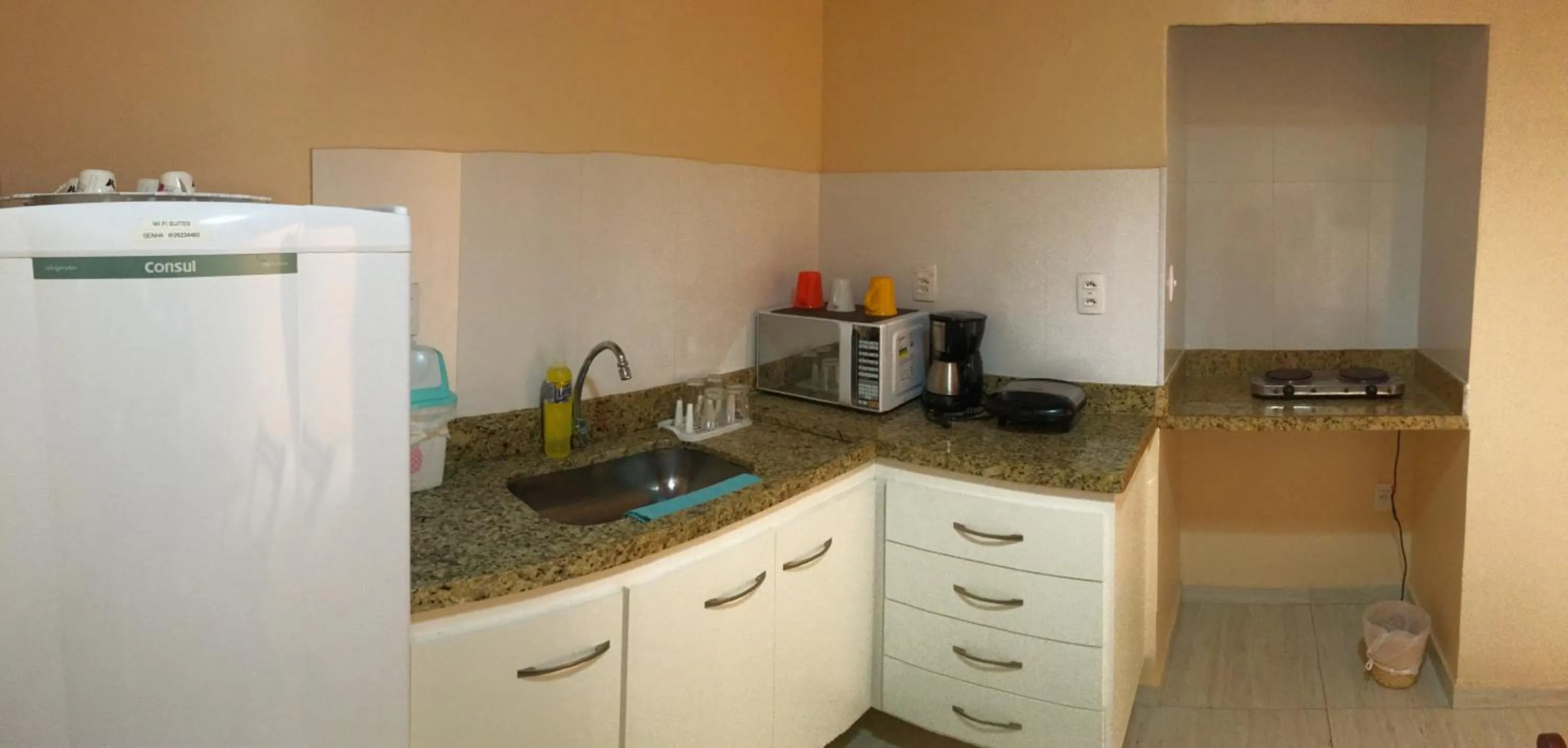 Kitchen or kitchenette in Apartamento no Centro Búzios