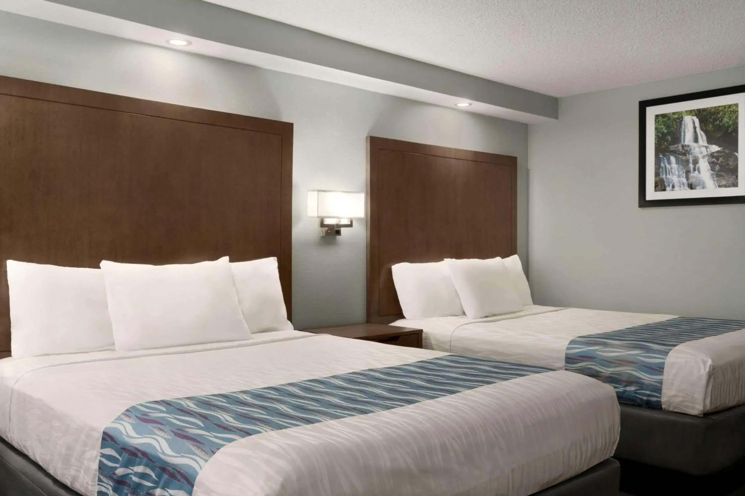 Connecting Room: 4 Queen Beds. Riverview Balcony. in Gatlinburg River Inn Connecting Room: 4 Queen Beds. Riverview Balcony. in Gatlinburg River Inn