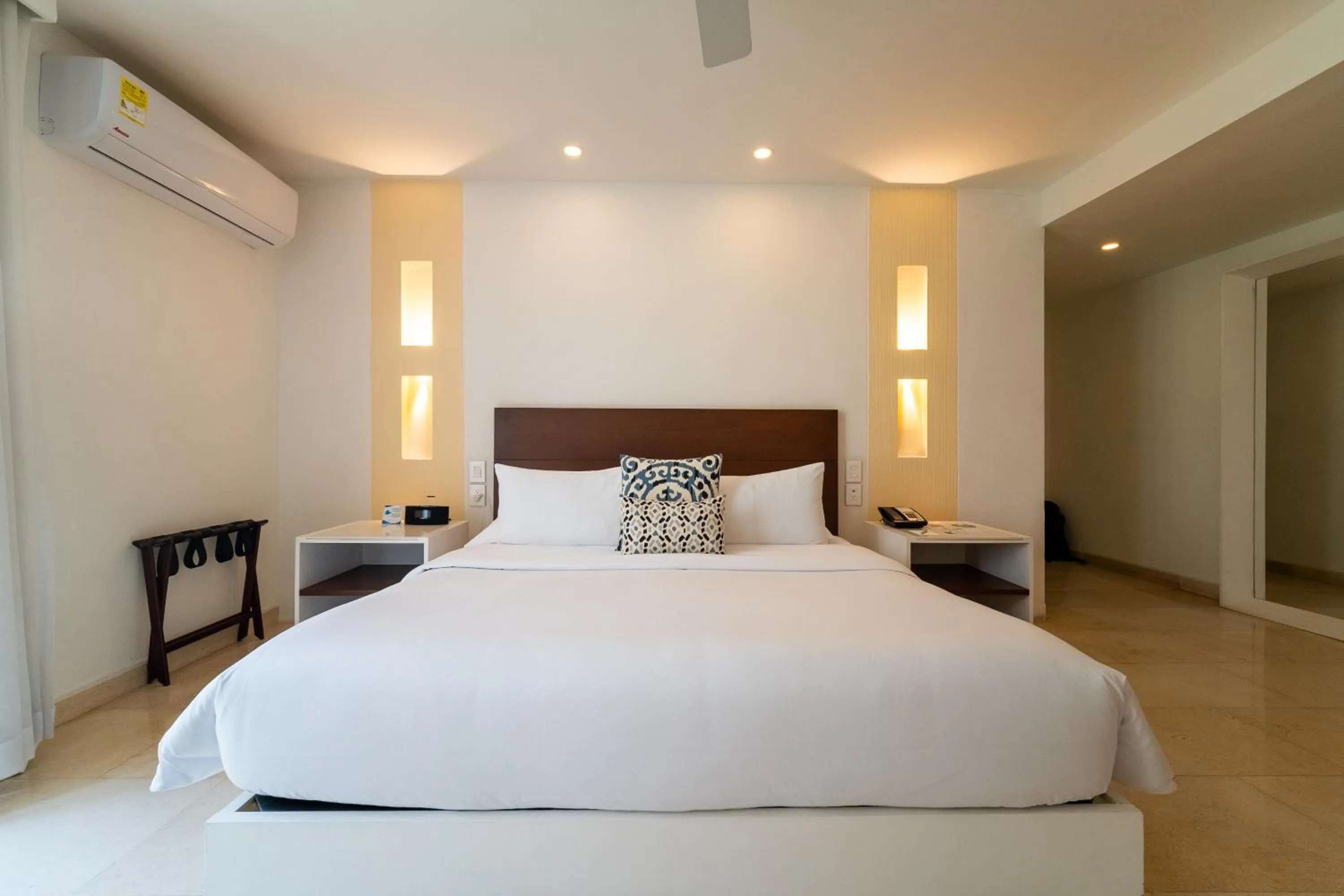 Bedroom, Bed in Nacar Hotel Cartagena, Curio Collection by Hilton