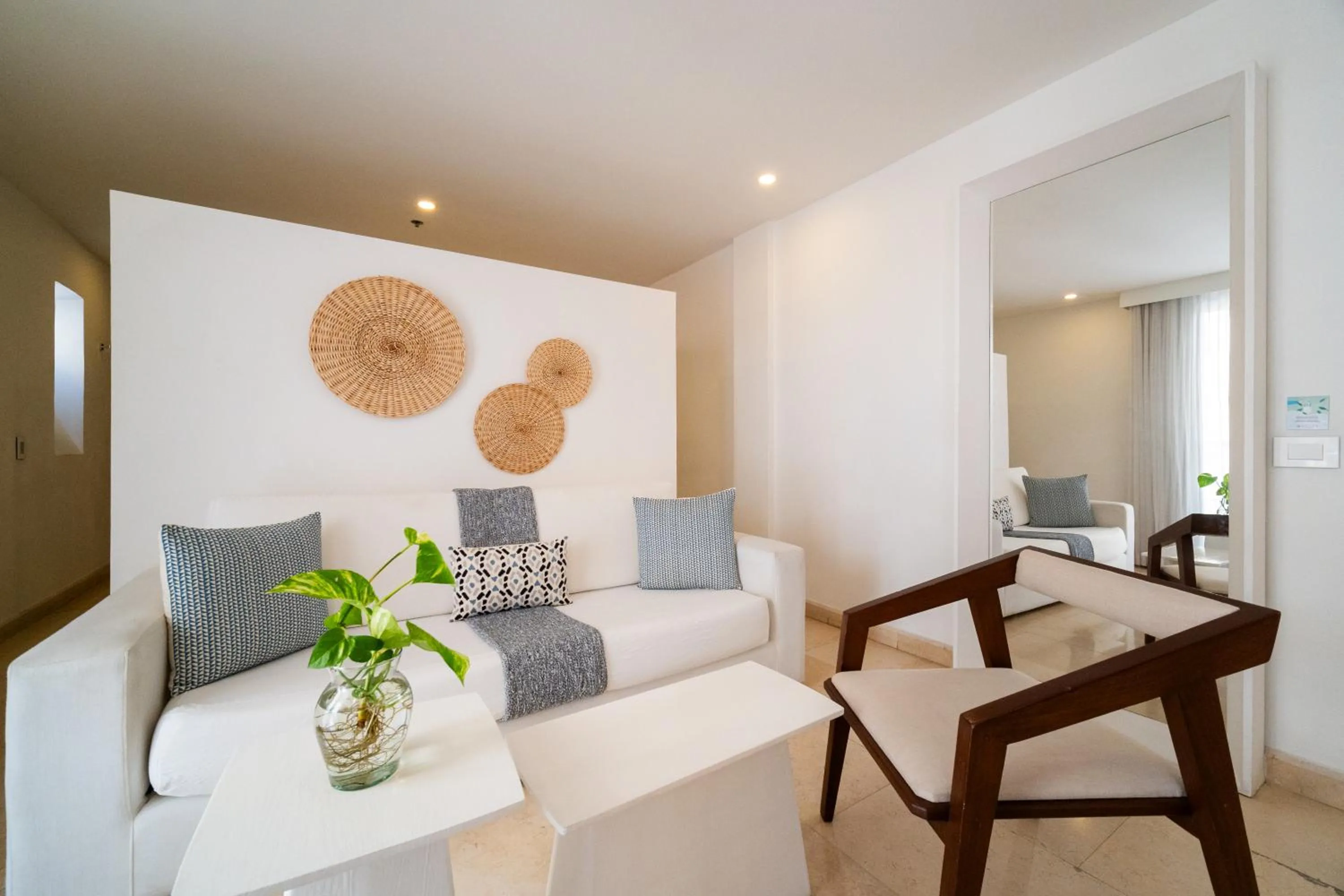 Seating area in Nacar Hotel Cartagena, Curio Collection by Hilton