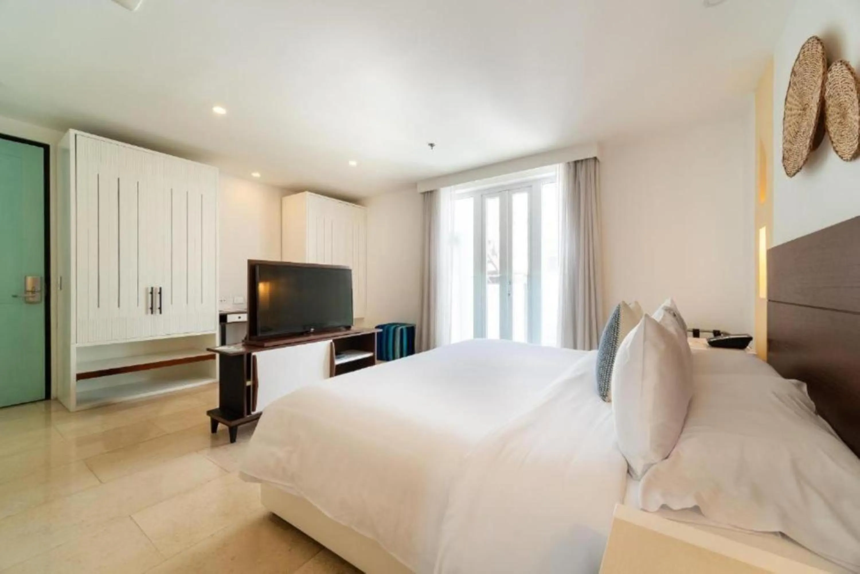 Bed in Nacar Hotel Cartagena, Curio Collection by Hilton