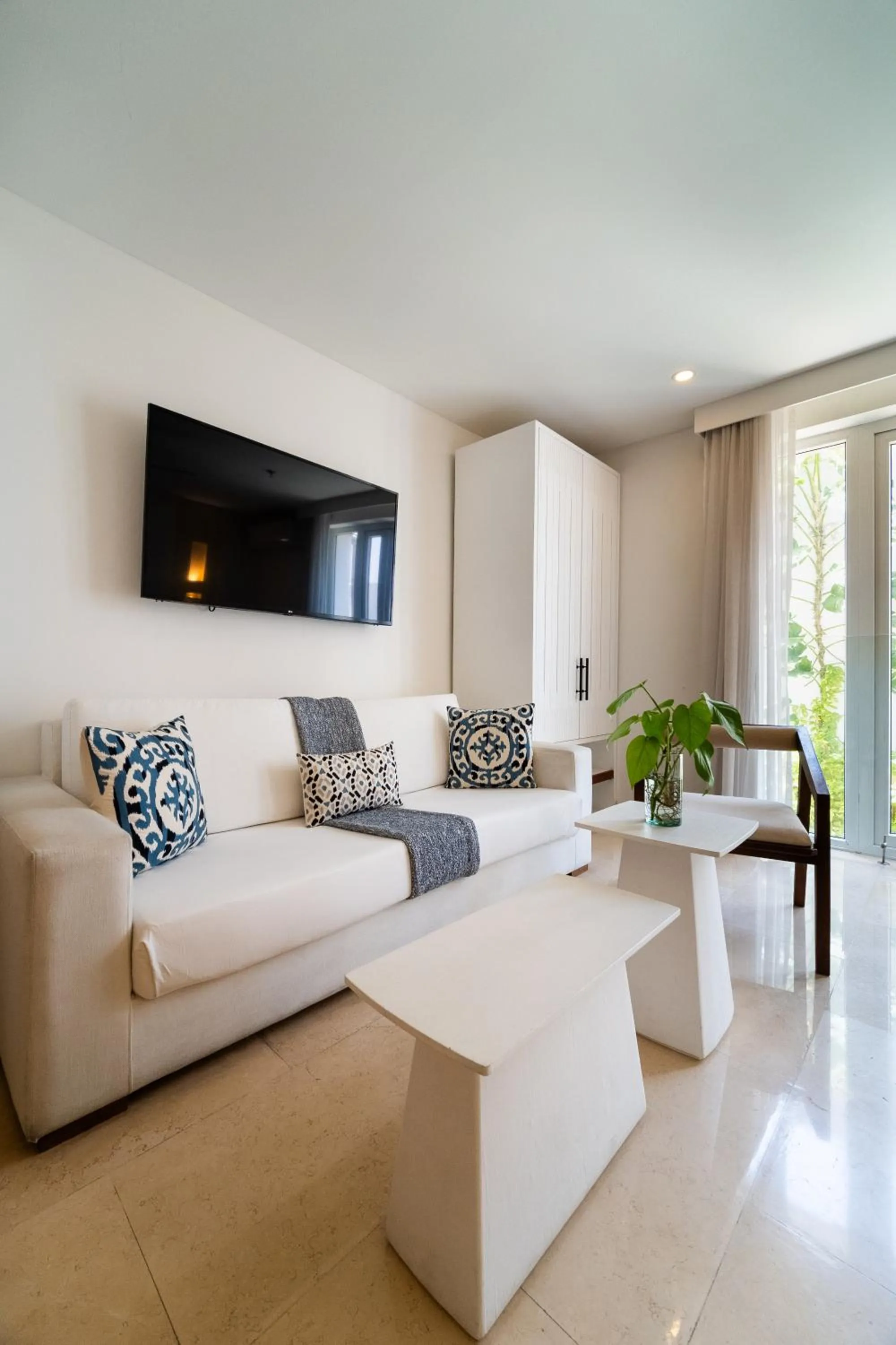 Seating area in Nacar Hotel Cartagena, Curio Collection by Hilton