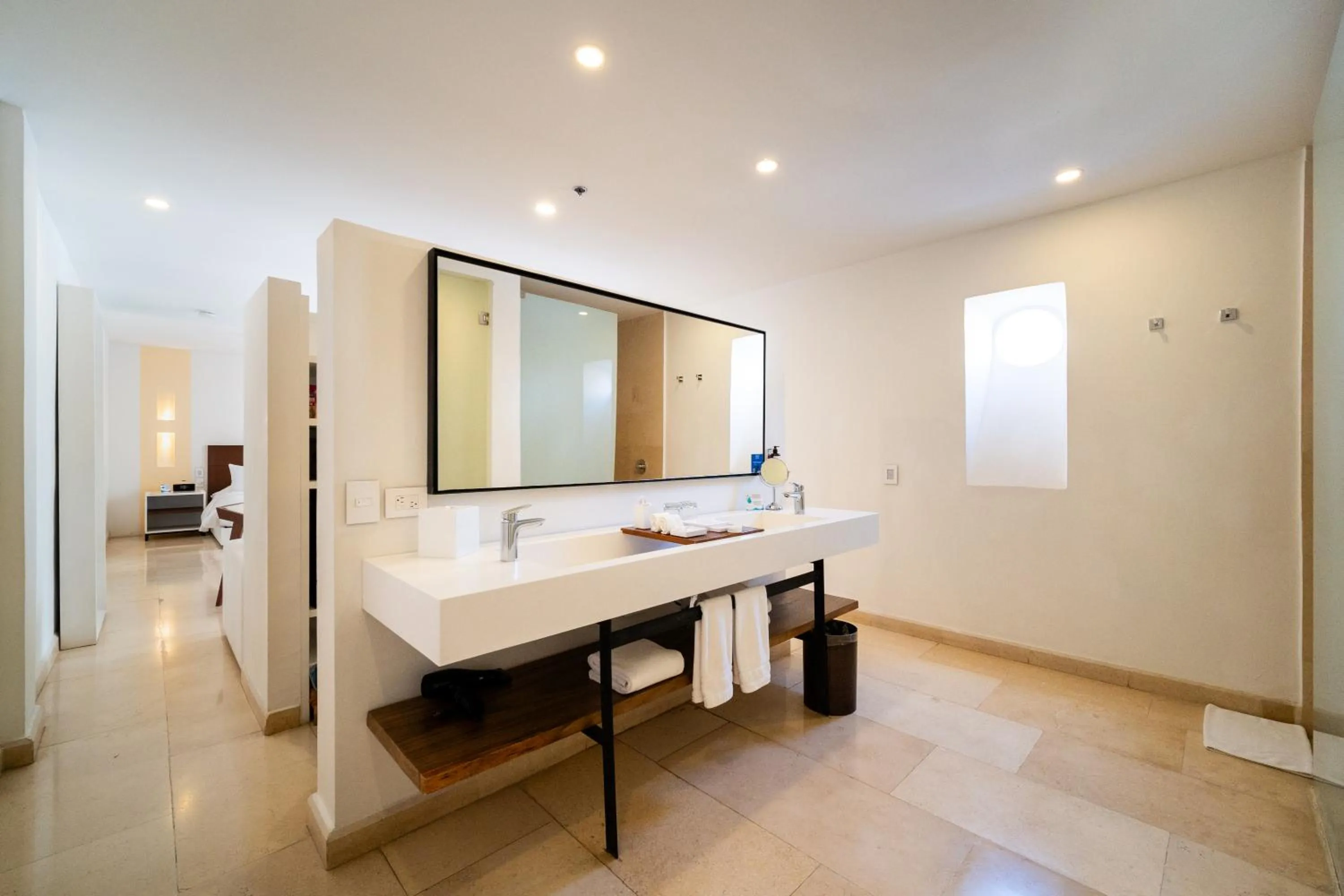Bathroom in Nacar Hotel Cartagena, Curio Collection by Hilton