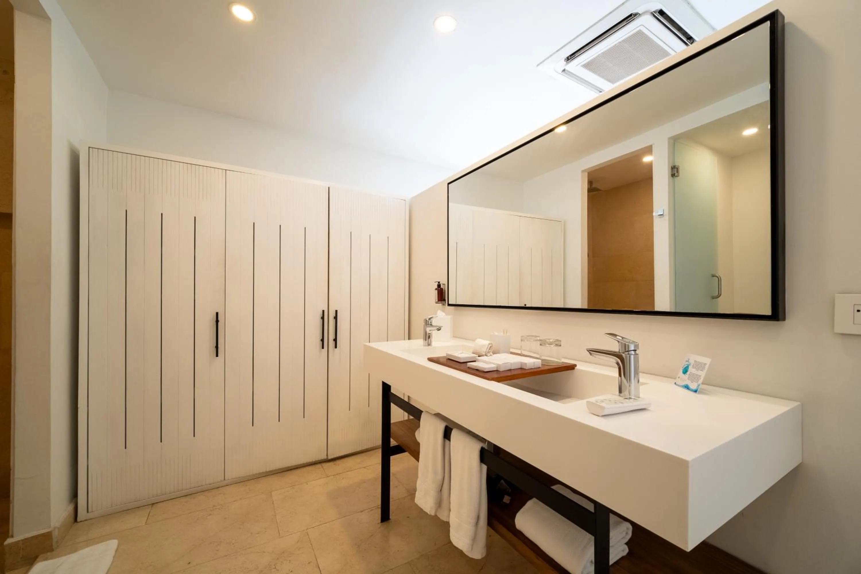 Bathroom in Nacar Hotel Cartagena, Curio Collection by Hilton
