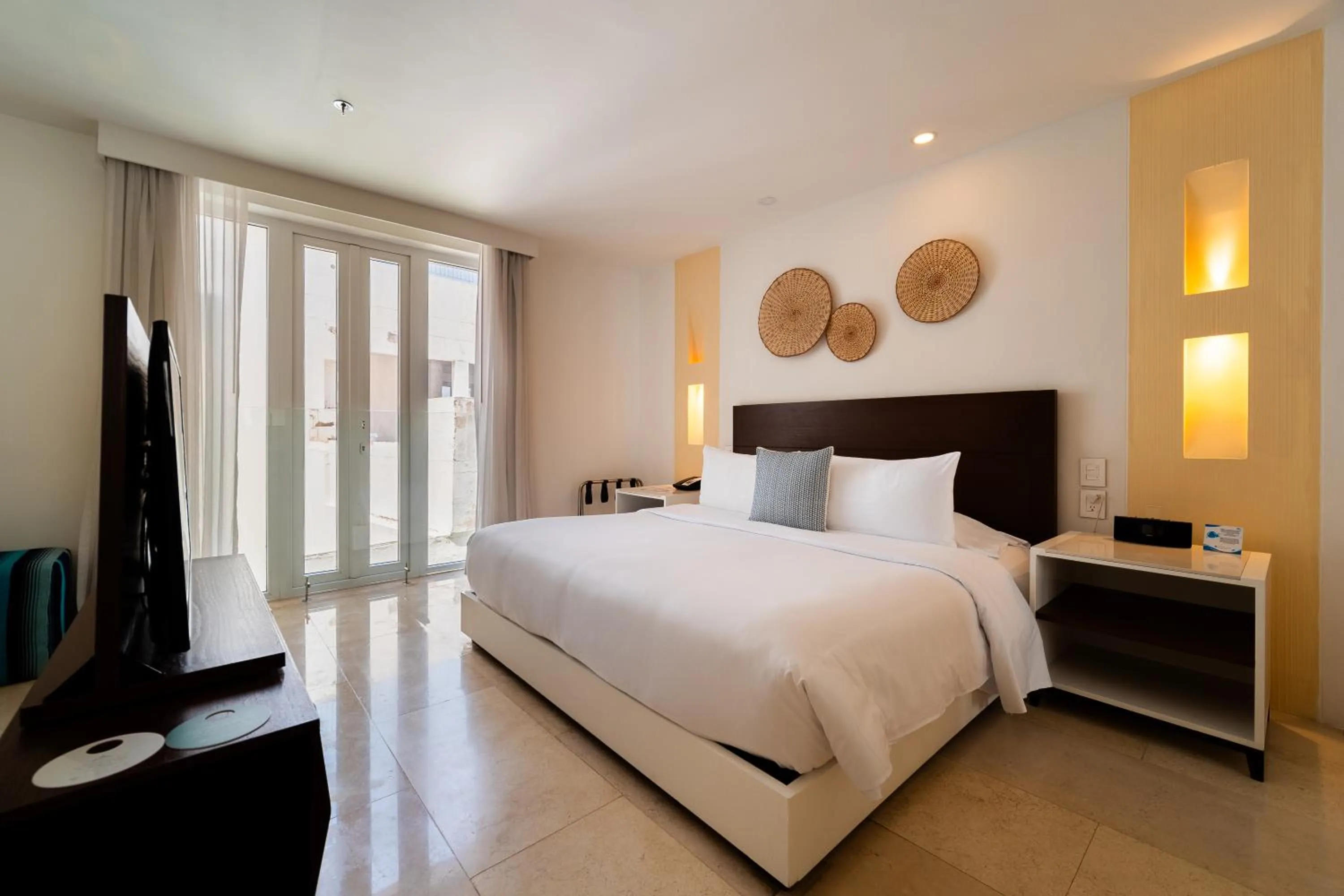 Photo of the whole room, Bed in Nacar Hotel Cartagena, Curio Collection by Hilton
